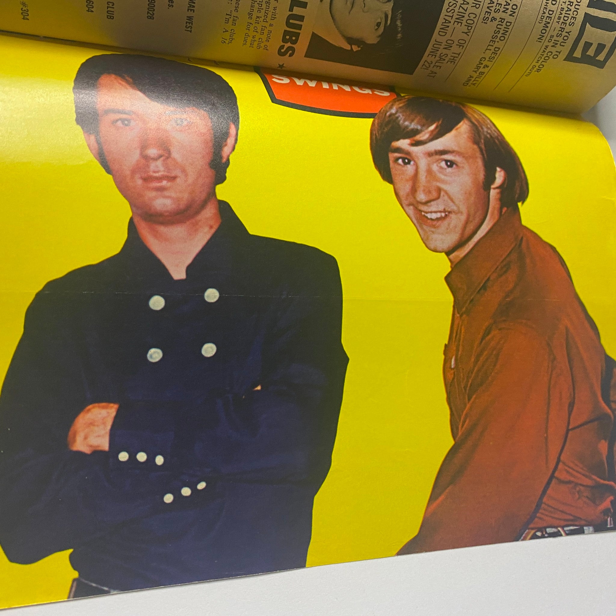 Two members of The Monkees featured in 16 Magazine July 1967 Vol 9 No. 2, posed side by side in stylish outfits, highlighting their charm and appeal.