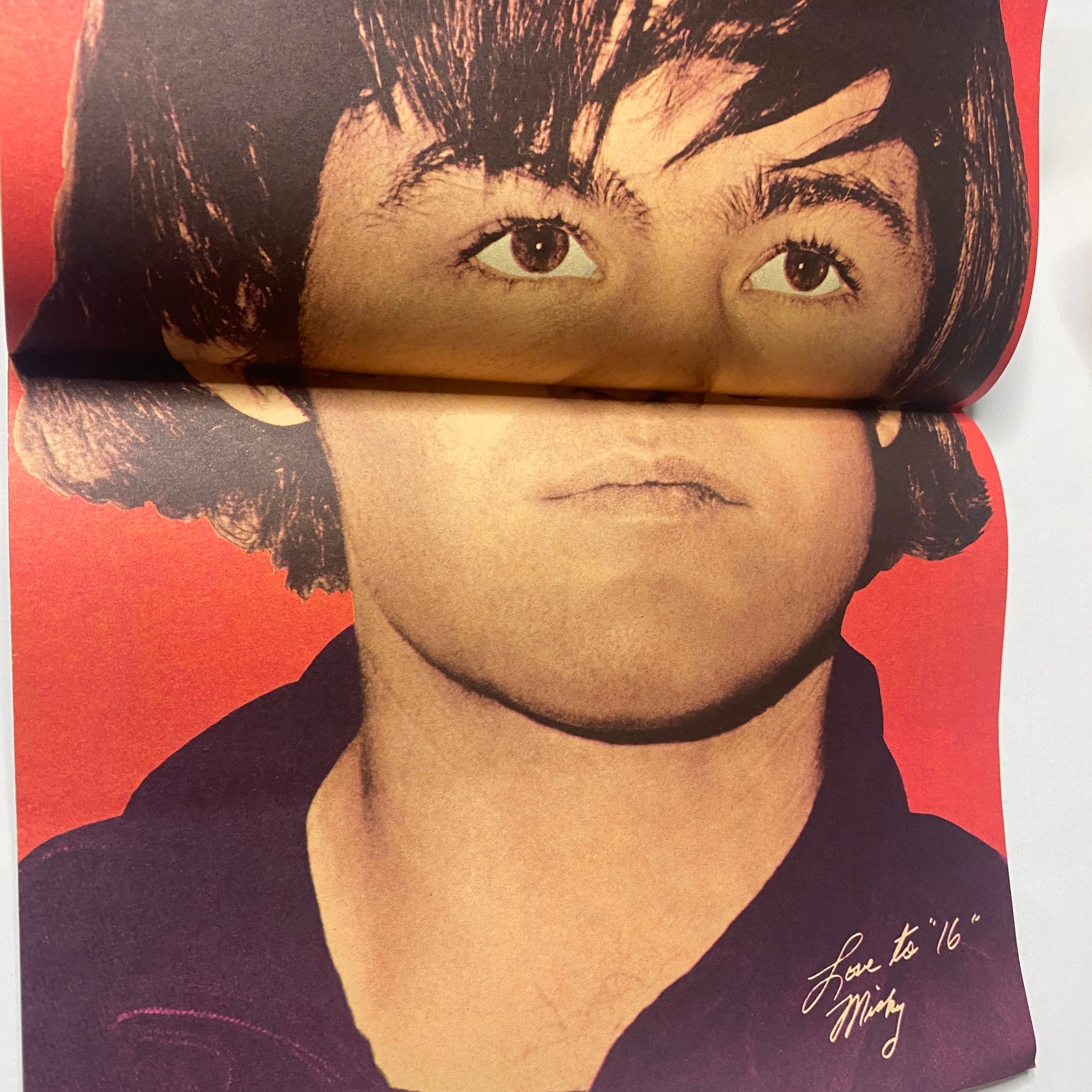 Close-up portrait of Micky Dolenz from 16 Magazine August 1967 Vol 9 No. 3, featuring a stylized image and handwritten signature 'Love to 16 Micky.' This magazine highlights icons of the 1960s.