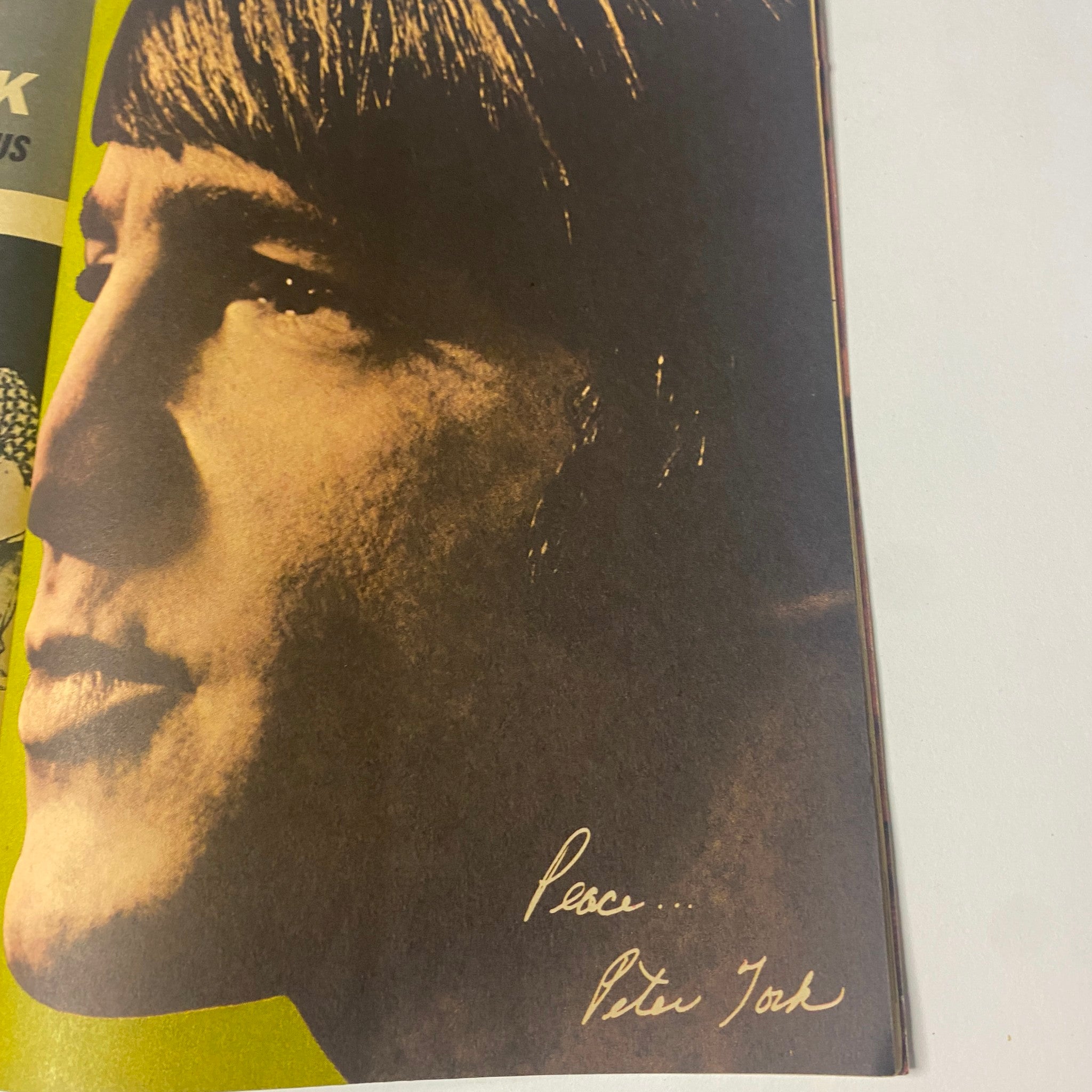 Profile portrait of Peter Tork from 16 Magazine August 1967 Vol 9 No. 3, showcasing a classic hairstyling with the handwritten message 'Peace... Peter Tork.' This issue features memorable teen idols.