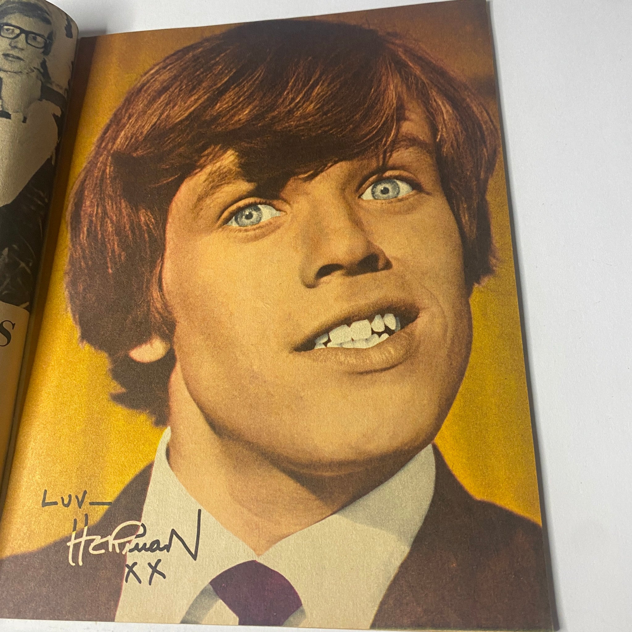 Clay Cole featured in 16 Magazine April 1966, posing in a suit with a charming smile and signature, highlighting his youthful charisma.
