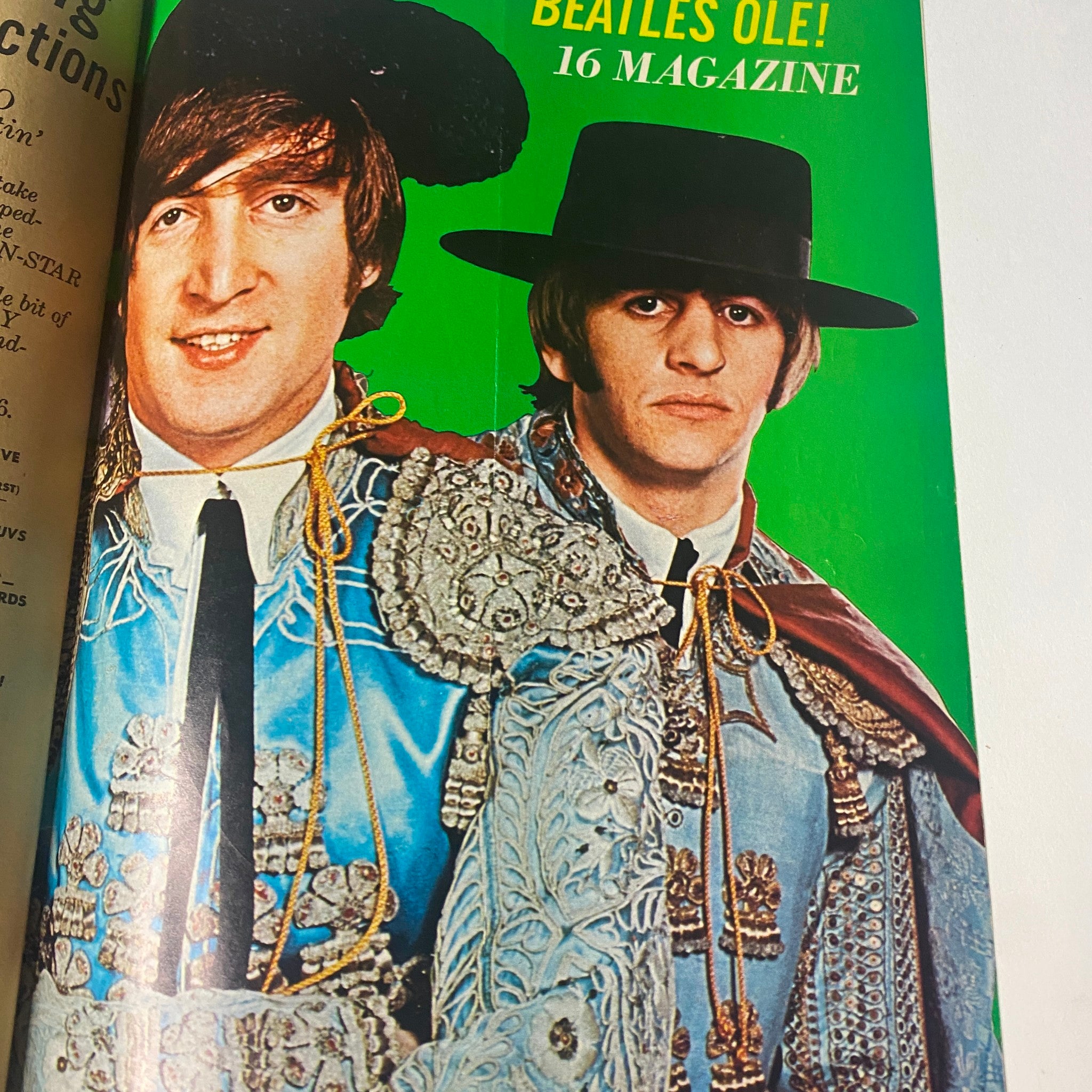 The Beatles Ole! feature in 16 Magazine June 1966, showcasing John Lennon and Ringo Starr in traditional matador outfits, highlighting the vibrant 1960s culture.