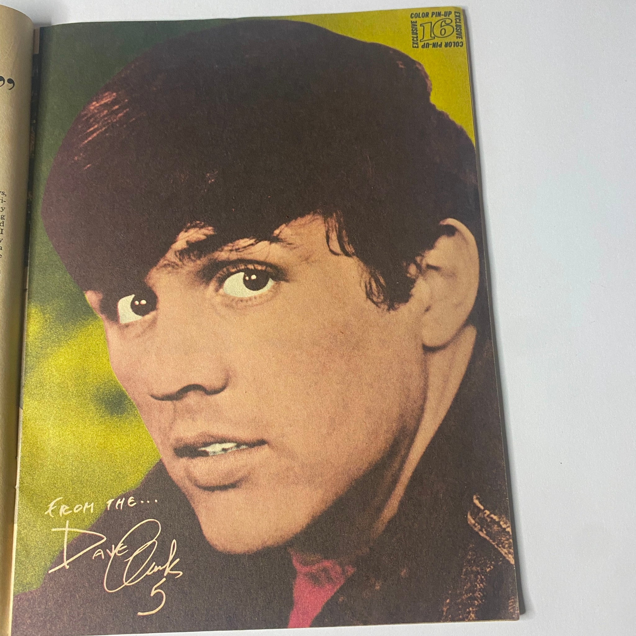 A striking image of Dave Clark from 16 Magazine, August 1966, Vol. 8, No. 3, showcasing his captivating gaze and signature.