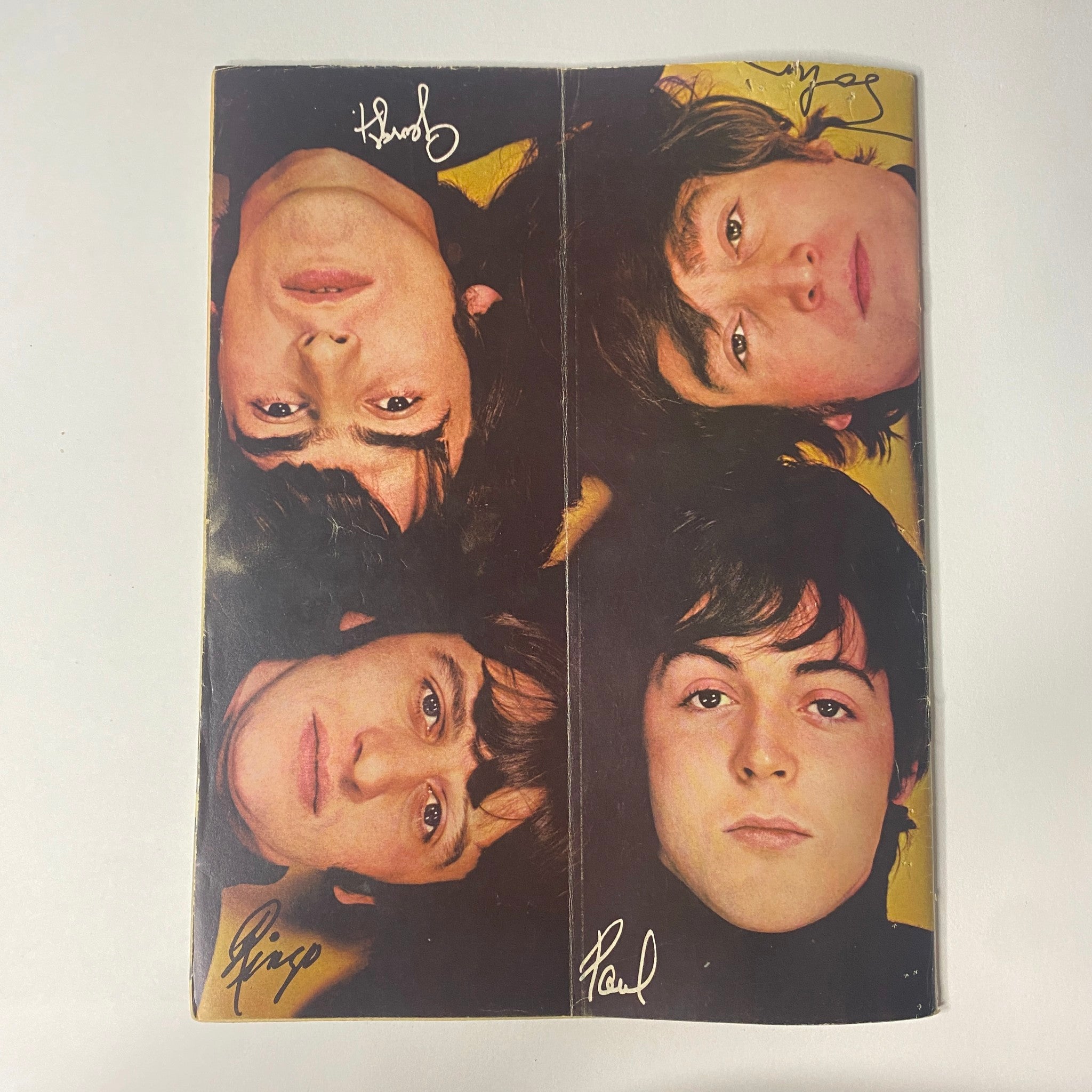 Close-up of The Beatles members featured in a signed pin-up from '16 Magazine November 1966 Vol 8 No. 6', including Paul McCartney and George Harrison.