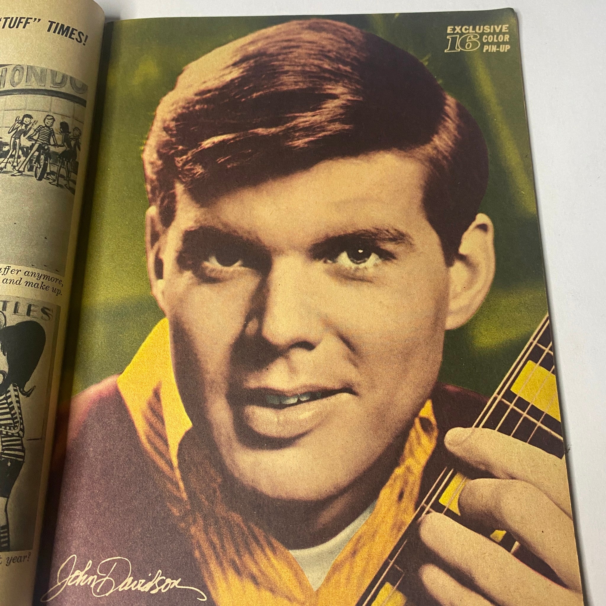 Exclusive color pin-up of John Davidson, a popular teen idol, from 16 Magazine October 1966 Vol 8 No. 5, highlighting his charming smile and musical talent.