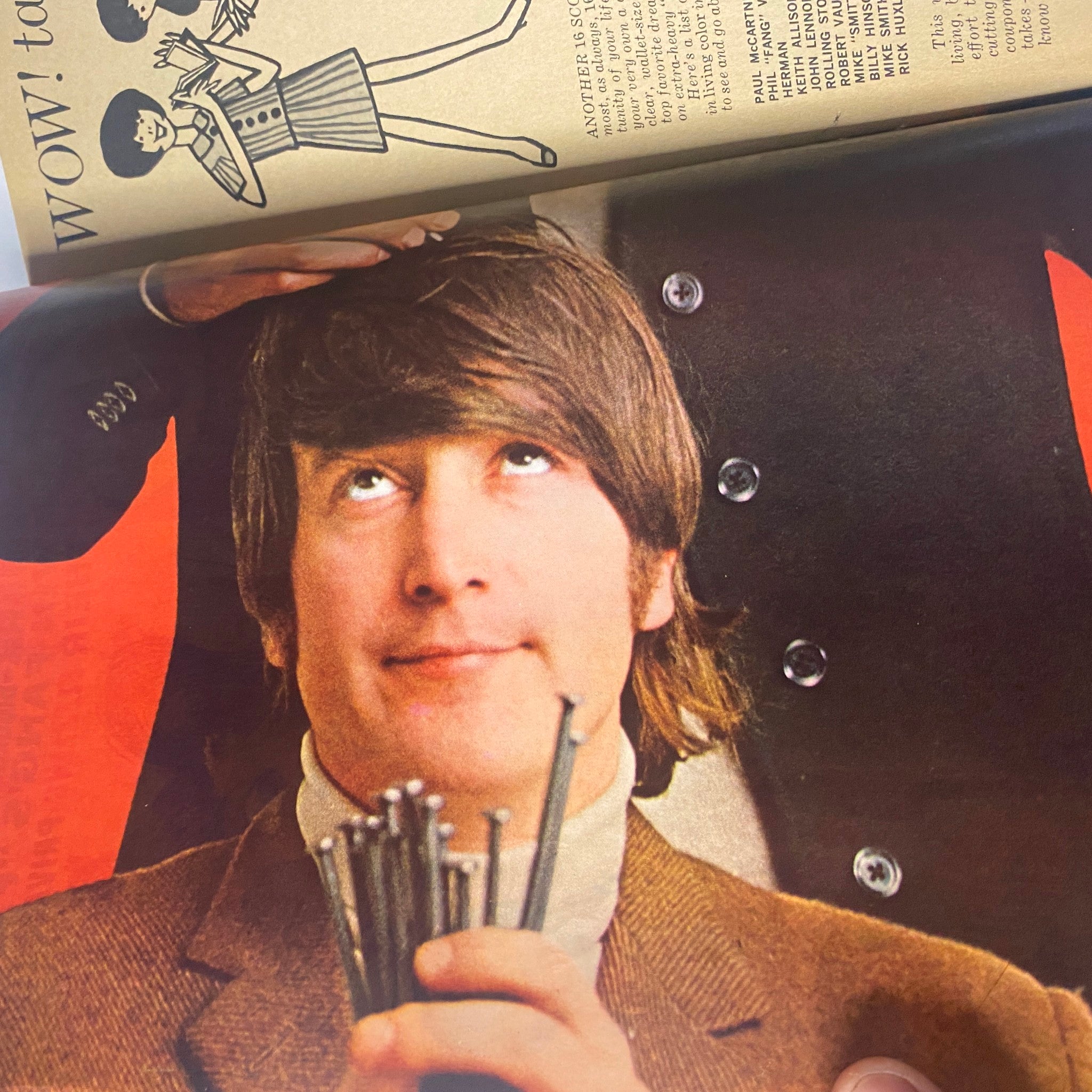 Image of a Beatles member holding metal objects with a humorous expression from 16 Magazine January 1967 Vol. 8 No. 8, showcasing playful content.