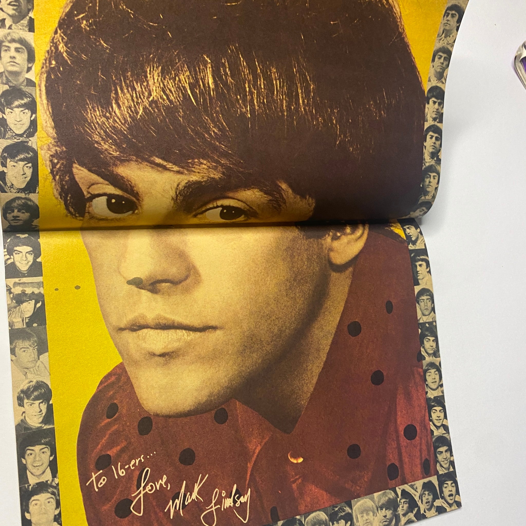 Close-up image of Mark Lindsay from Paul Revere & the Raiders in 16 Magazine January 1967 Vol. 8 No. 8, featuring a signature and promoting 1960s music culture.