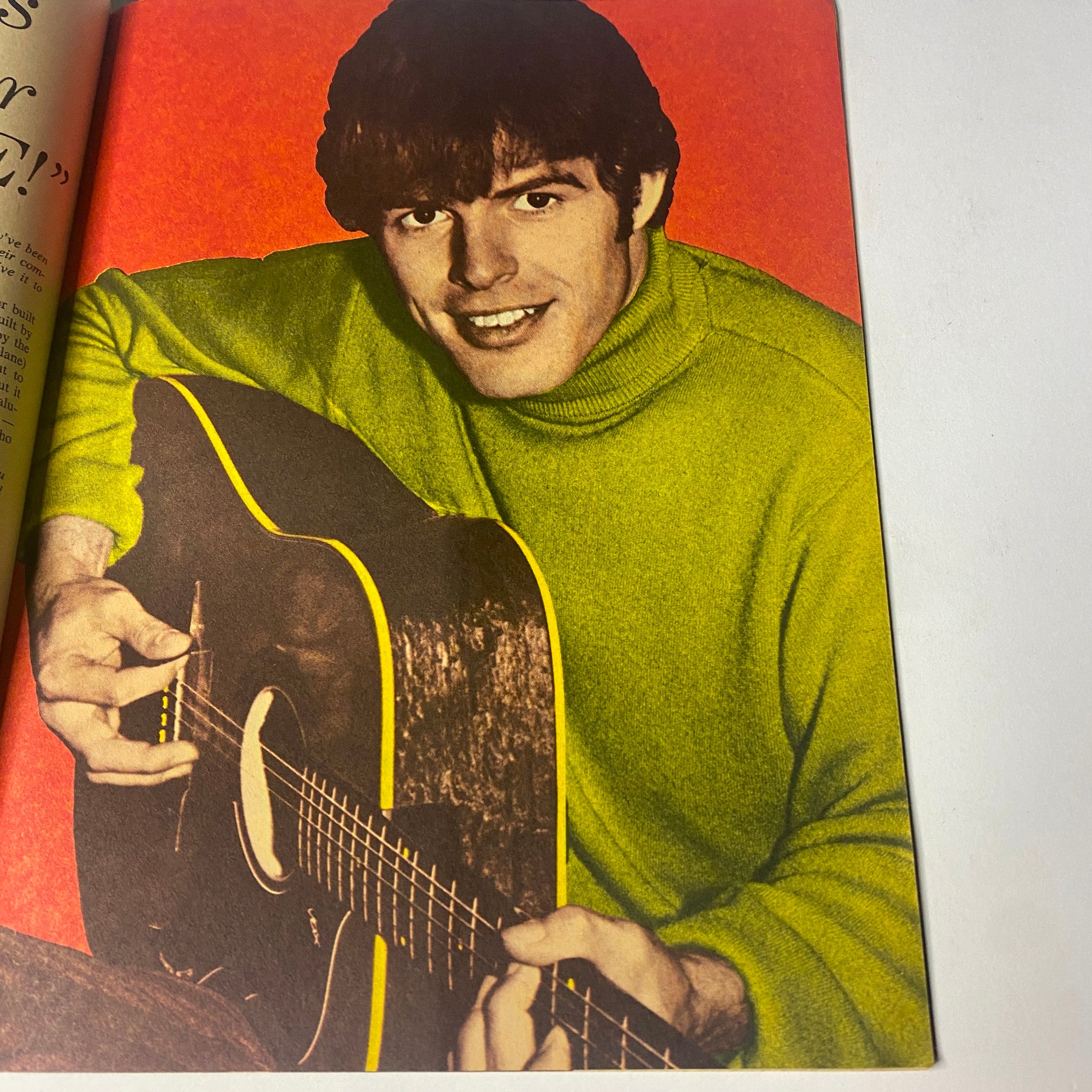 16 Magazine March 1967 Vol 8 No. 10 image of Peter Tork sitting with an acoustic guitar, showcasing his article in the magazine.