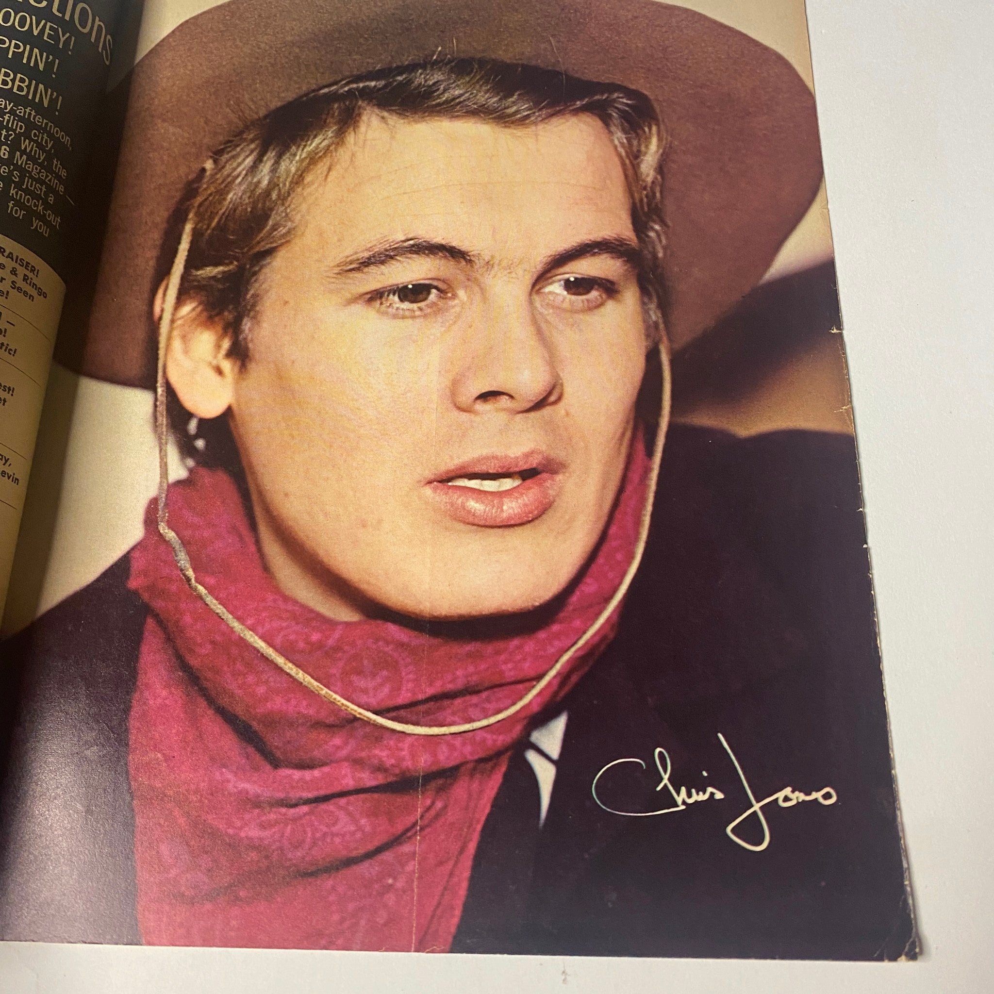 Chris Jones featured in 16 Magazine March 1966, captured in a striking image wearing a hat with his autograph, representing the youth culture of the era.