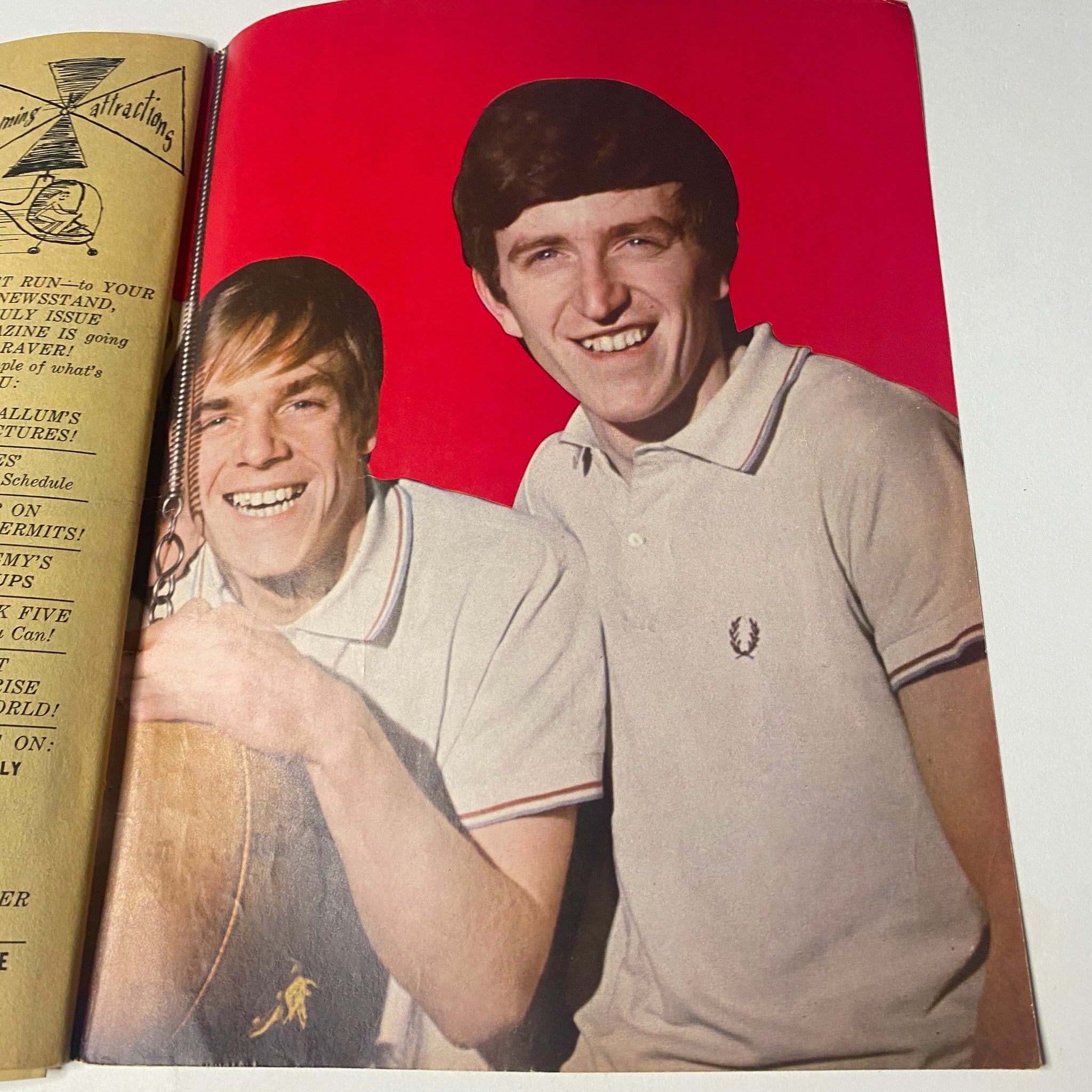 Dave Clark 5 featured in 16 Magazine June 1965 Vol 7 No. 1, showing two young male musicians smiling while holding a guitar.