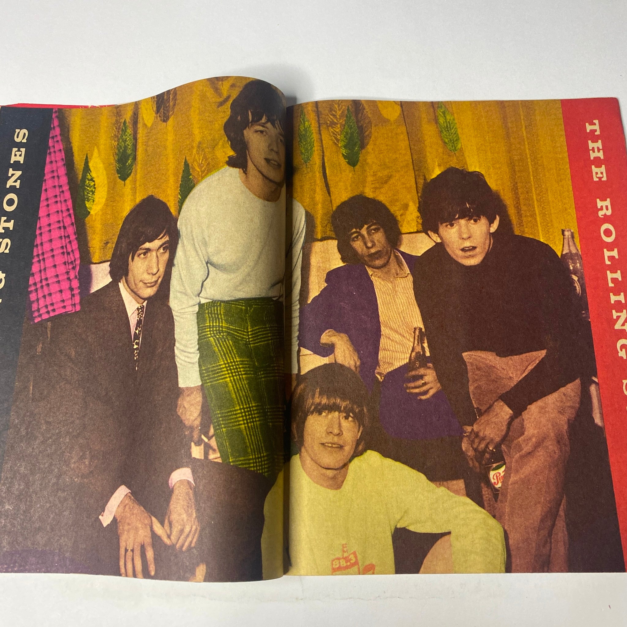 Inside spread of 16 Magazine February 1966 featuring The Rolling Stones, highlighting their presence in the magazine along with a vibrant photo of the band members together.