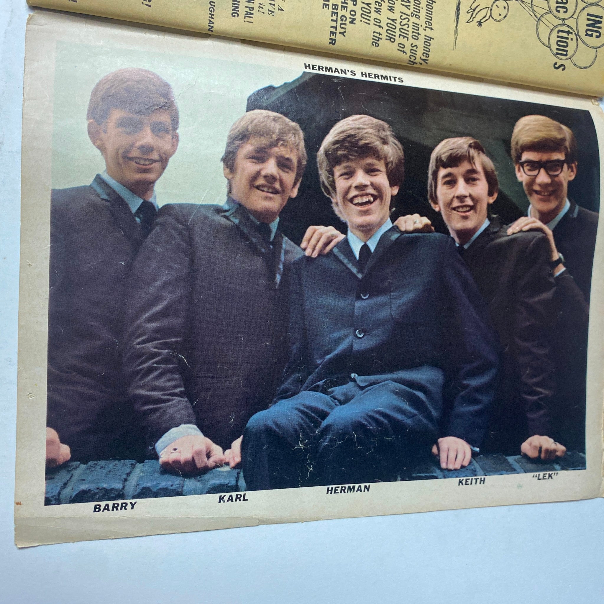 16 Magazine April 1965 features Herman's Hermits group photo with members Barry, Karl, Herman, Keith, and Lek in stylish suits, capturing the essence of the British Invasion era.