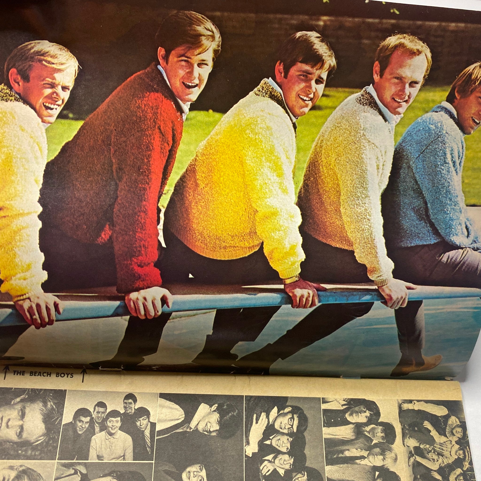 Image depicting The Beach Boys in colorful sweaters, showcasing their iconic style from the 1960s featured in 16 Magazine December 1965 Vol 7 No. 7.