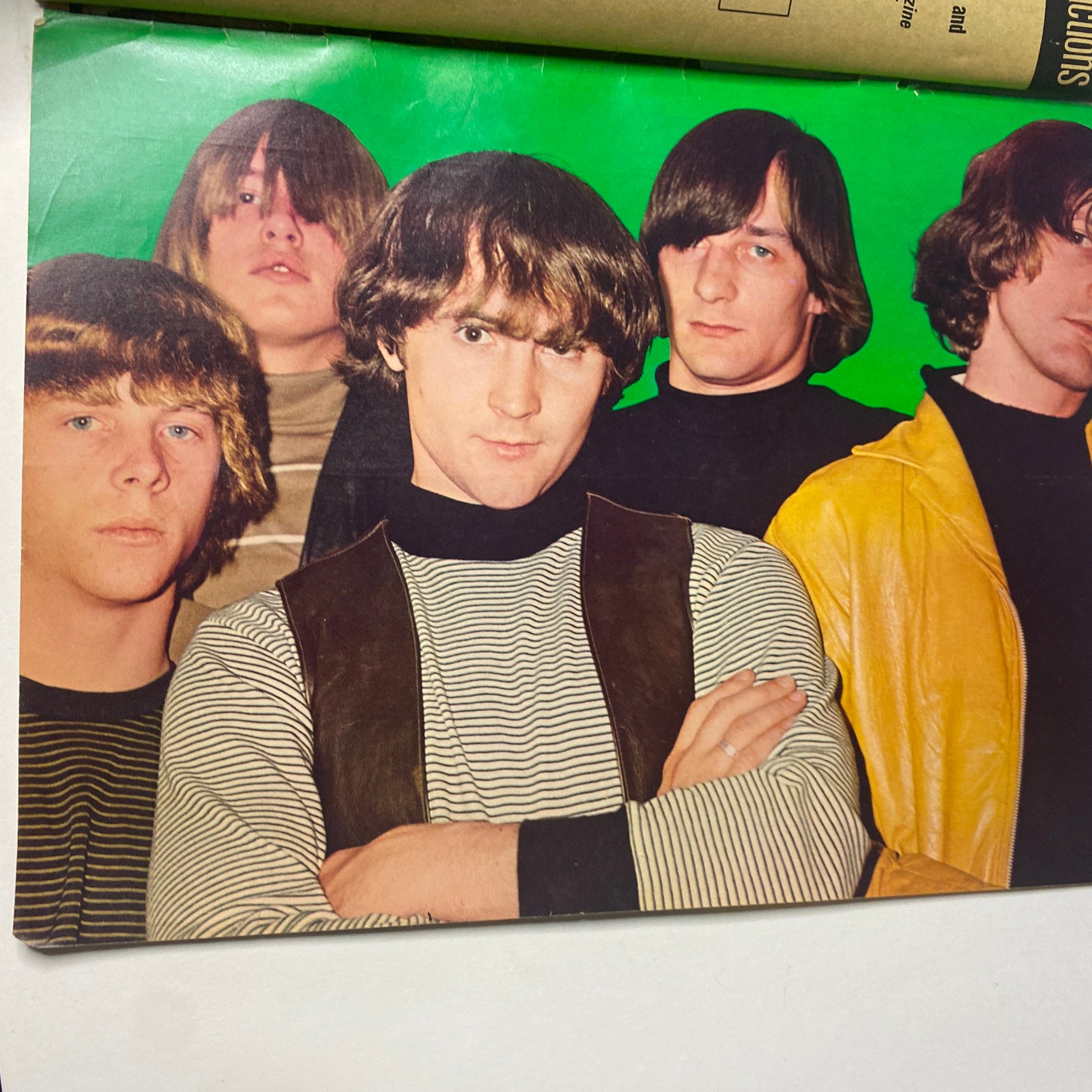 Image from 16 Magazine December 1965 Vol 7 No 7 featuring a group of five male musicians in stylish outfits, reflecting the fashion and music scene of the 1960s.