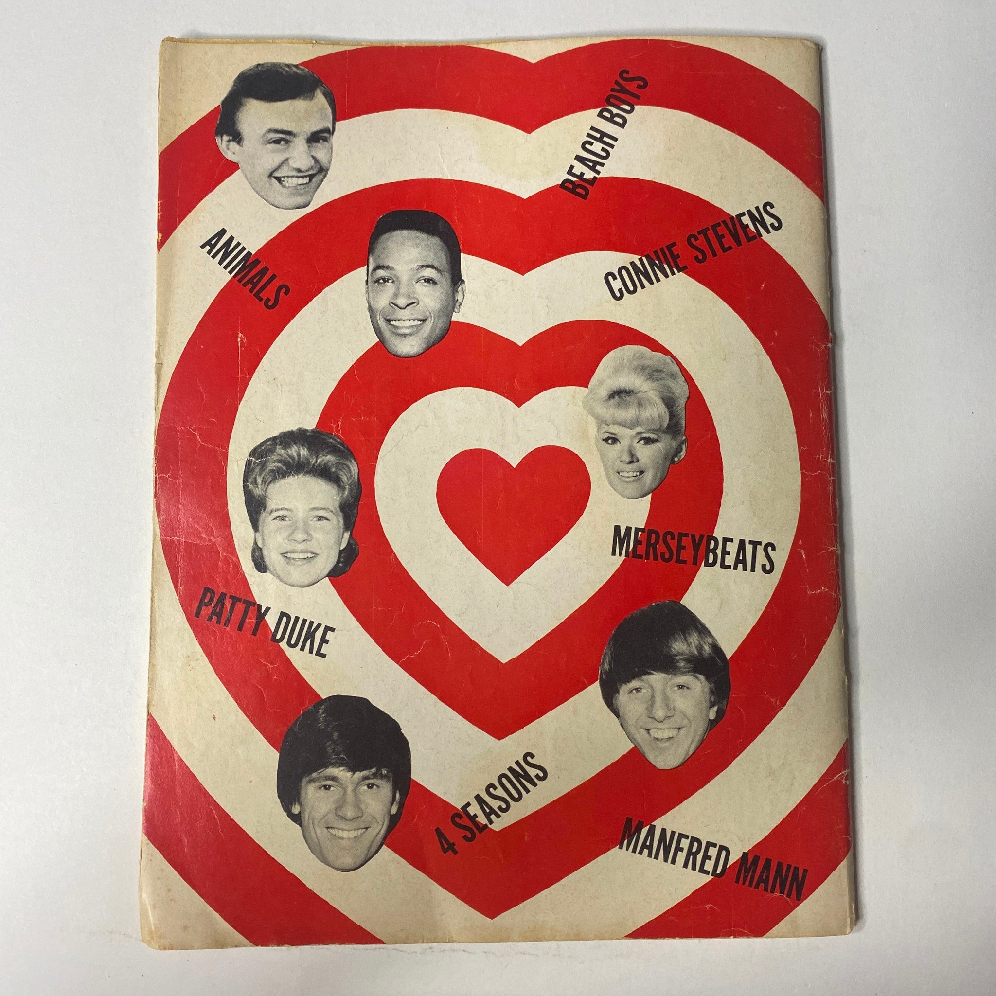 Back cover of 16 Magazine March 1965 featuring various artists including the Beach Boys and Connie Stevens in a heart design.
