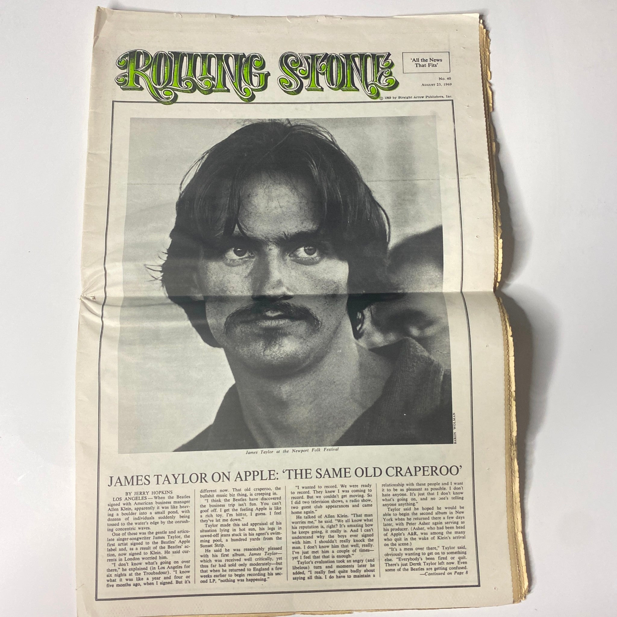 Interior page of Rolling Stone Magazine August 23, 1969 highlighting James Taylor's feature article titled 'The Same Old Craperoo', with a portrait of Taylor.