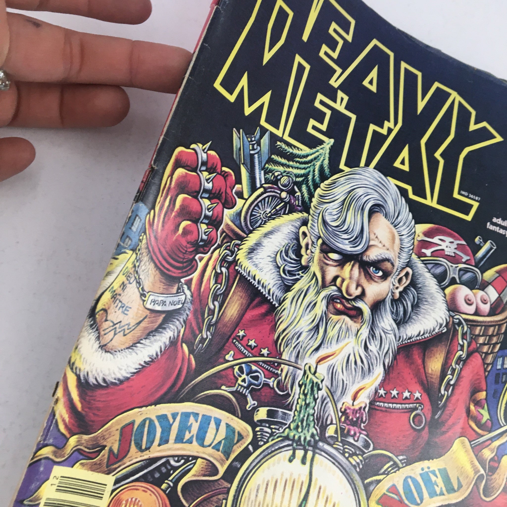 Close-up of Heavy Metal Magazine December 1977 cover depicting the character from Vuzz Chapter 2 by Druillet, illustrating detailed artwork with a passionate expression.
