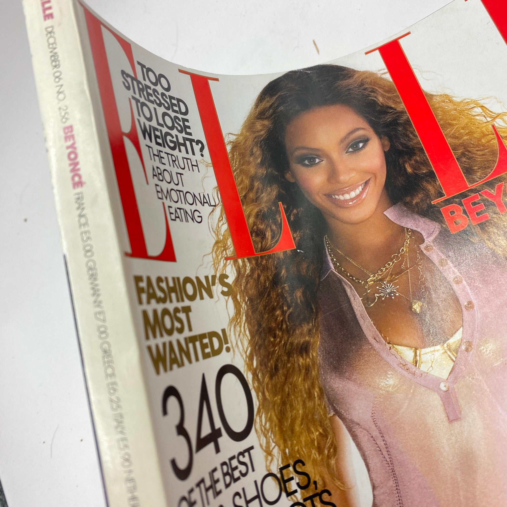 Close-up of Elle Magazine December 2006 cover with Beyoncé Knowles, emphasizing her iconic style and beauty.
