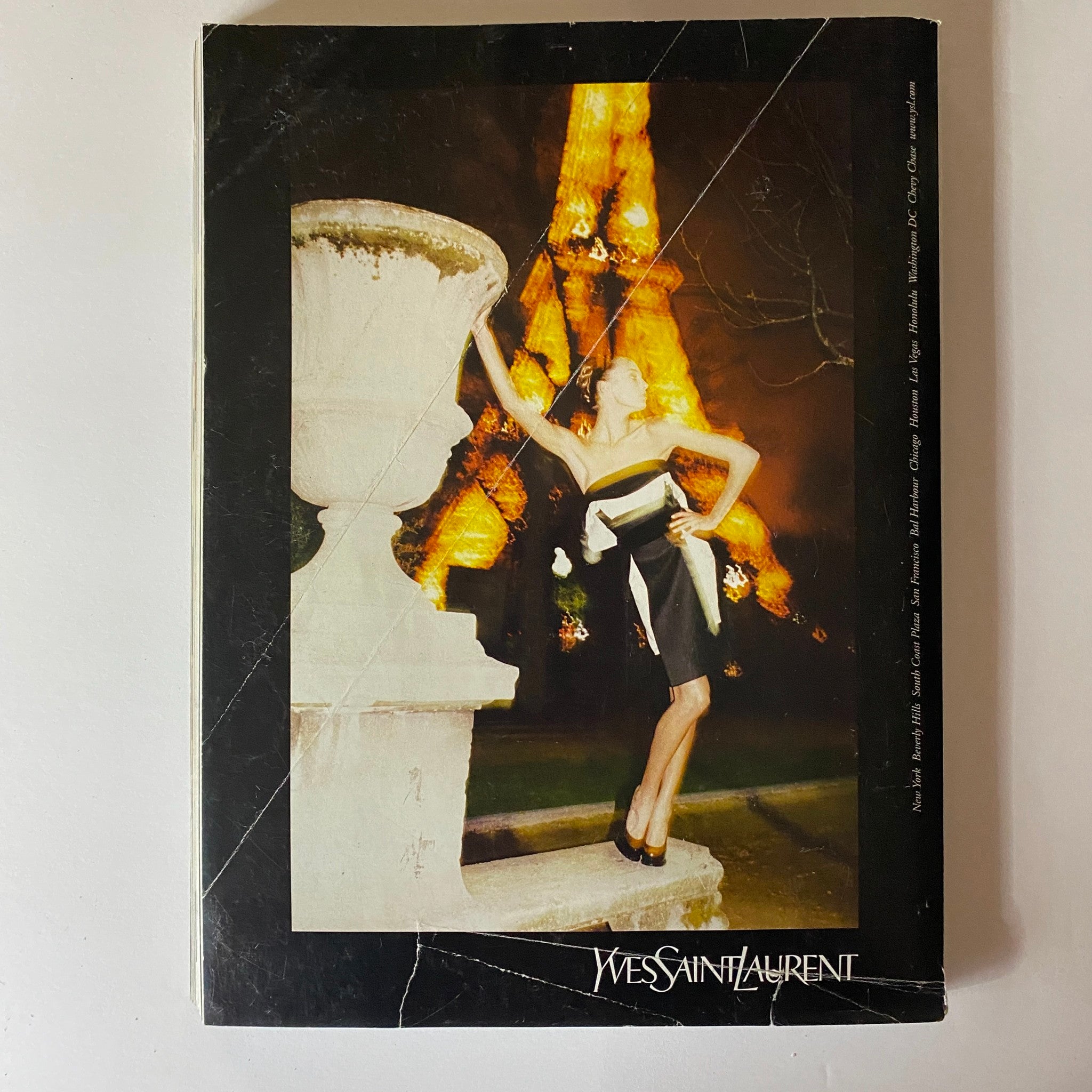Back cover of Elle Magazine October 2005 featuring a striking black and white photo from Yves Saint Laurent, complementing the issue's focus on fashion and style.