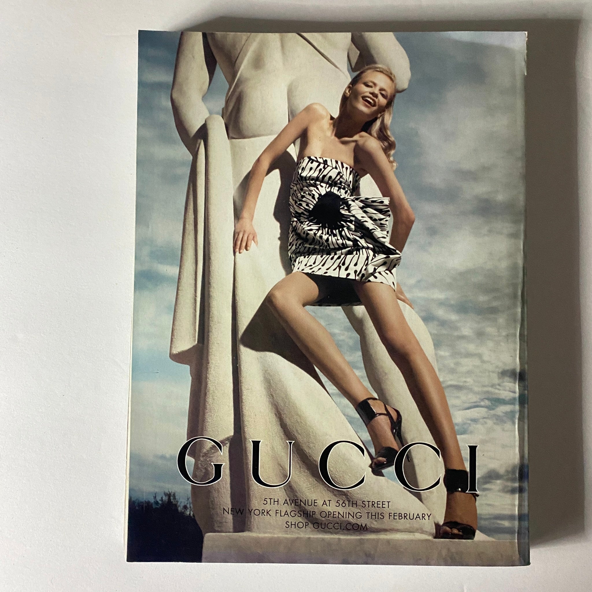 Advertisement page from Elle Magazine March 2008 showcasing Gucci's latest fashion campaigns.