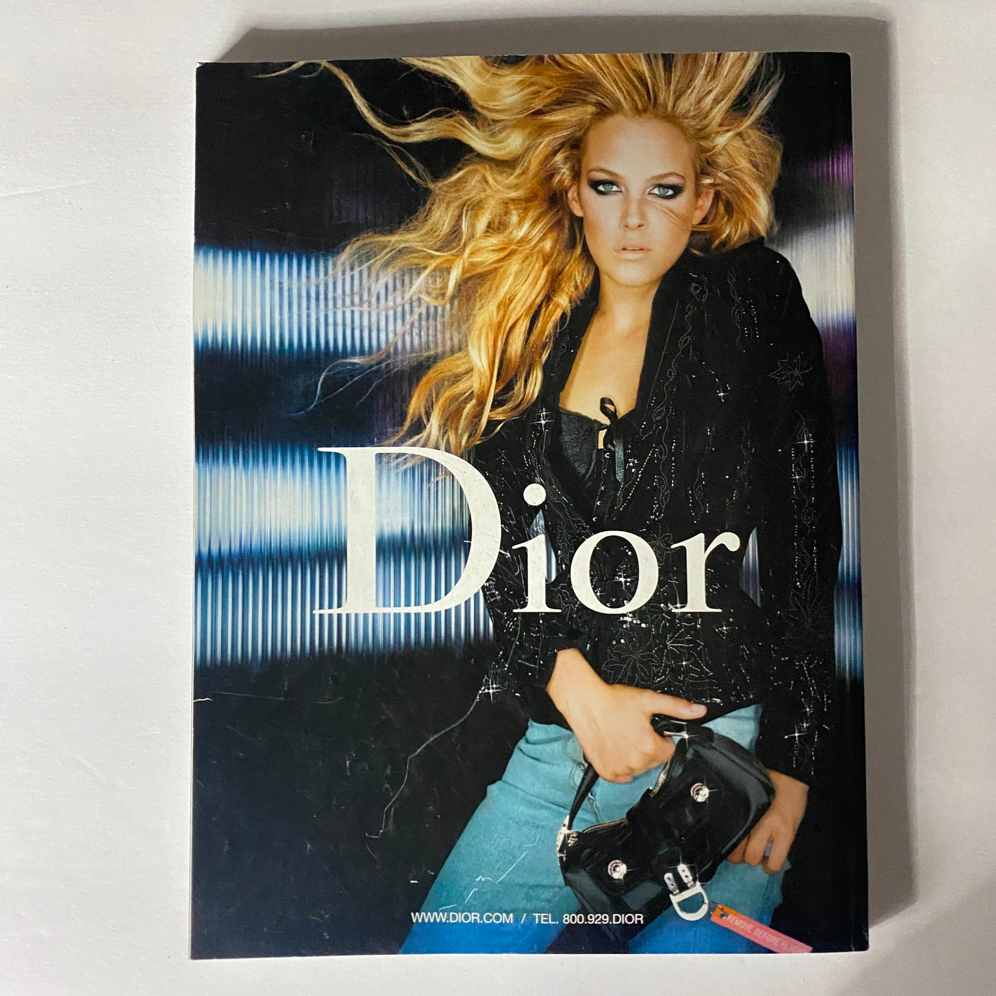Back cover of Elle Magazine December 2005, featuring a fashion model in a Dior advertisement.