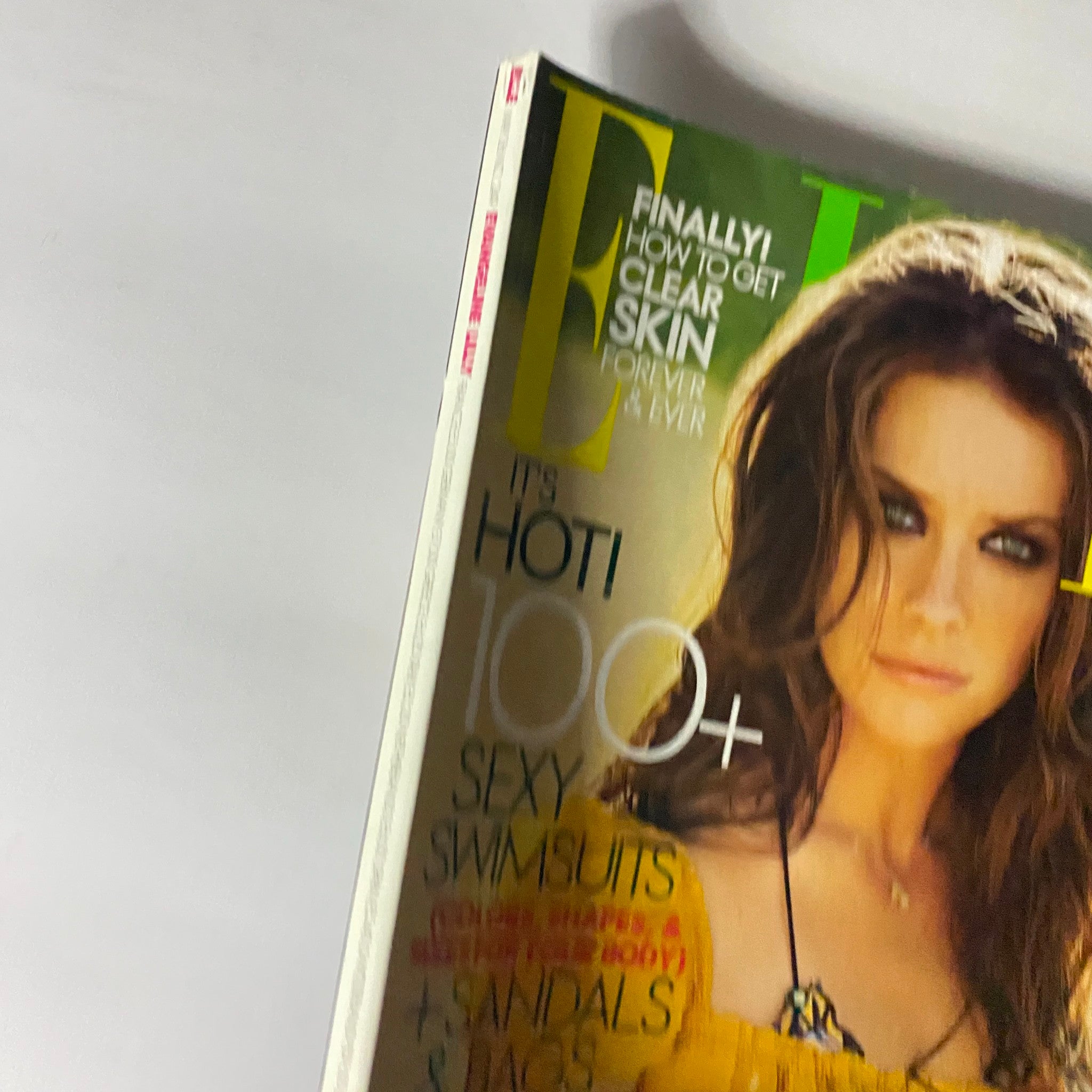 Cover of Elle Magazine from May 2006 featuring Evangeline Lilly, highlighting topics like fashion and beauty with a focus on style for the mid-2000s.