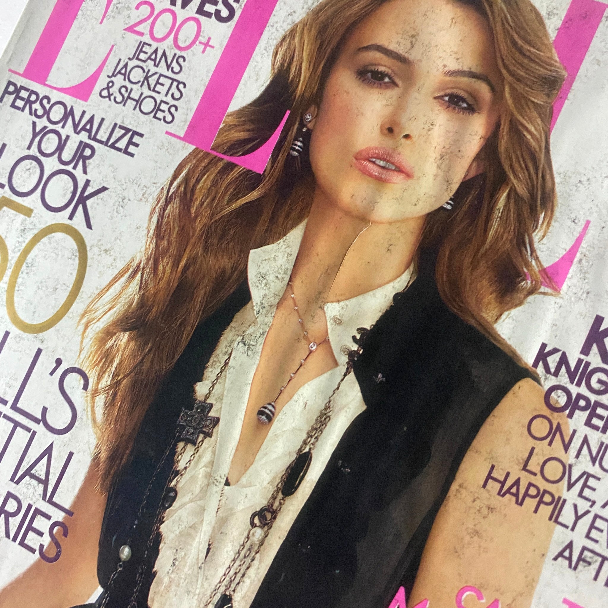 Close-up of the Elle Magazine August 2006 cover with Keira Knightley, highlighting her stylish look and accessories.