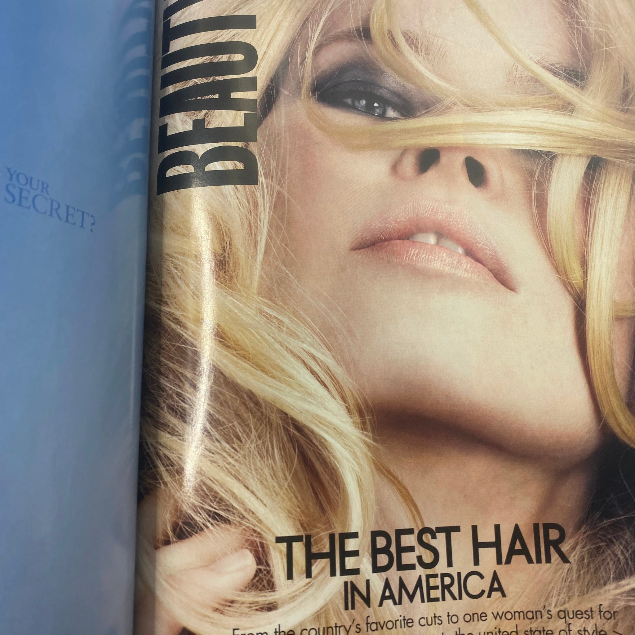 Elle Magazine August 2006 includes a beauty editorial titled 'The Best Hair in America' featuring a model with glamorous, flowing hair.
