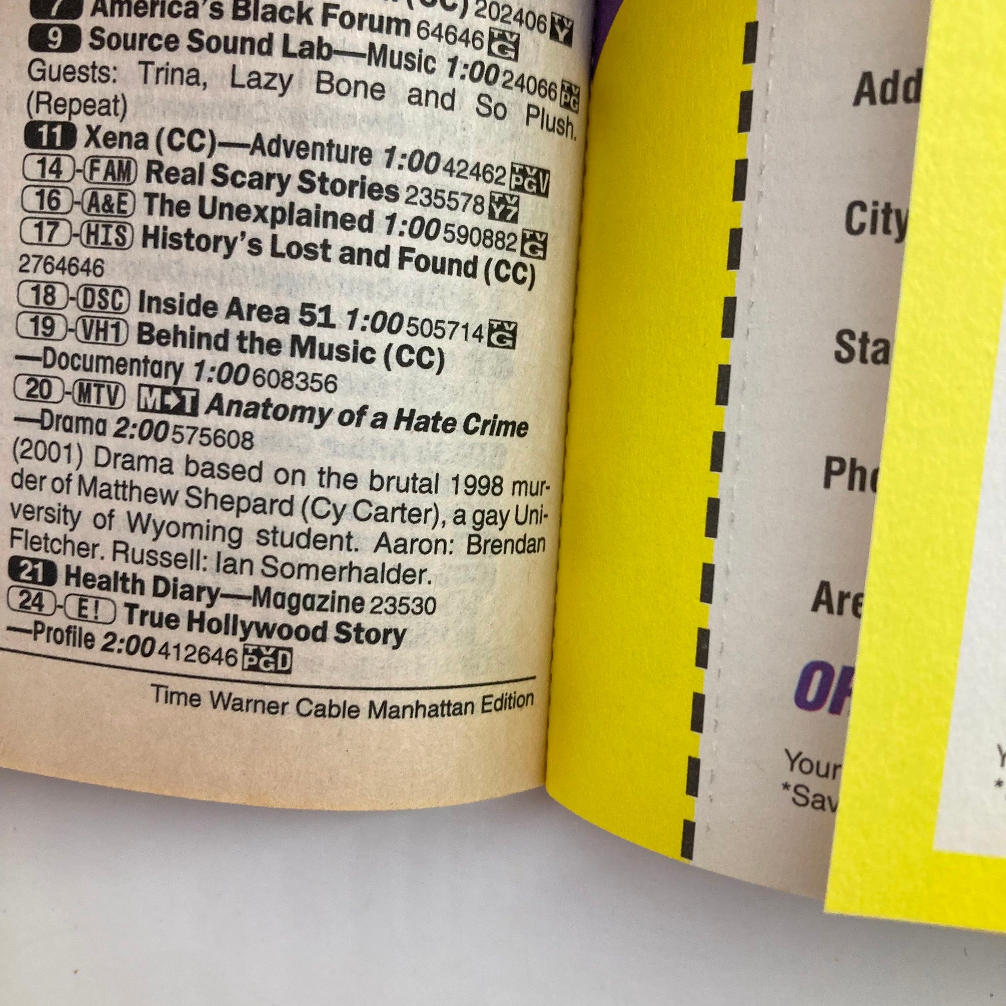 Inside view of the TV Guide Magazine January 13 2001, highlighting listings including 'Anatomy of a Hate Crime' and various shows, part of the Time Warner Cable Manhattan Edition.