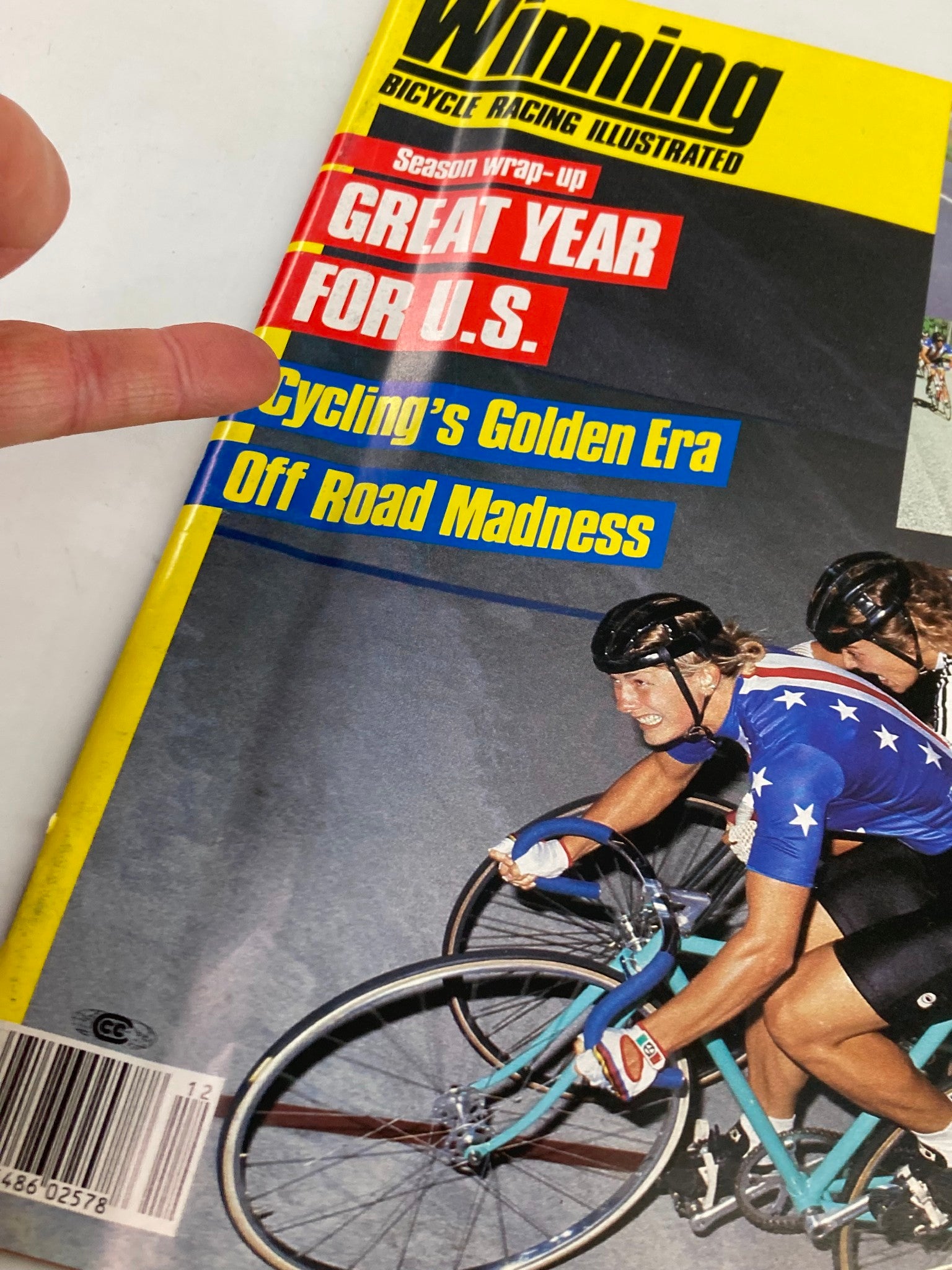 Close-up of the cover of Winning Bicycle Racing Illustrated December 1983 showcasing the prominent title and attention-grabbing headlines about U.S. cycling, including features on cycling legends.