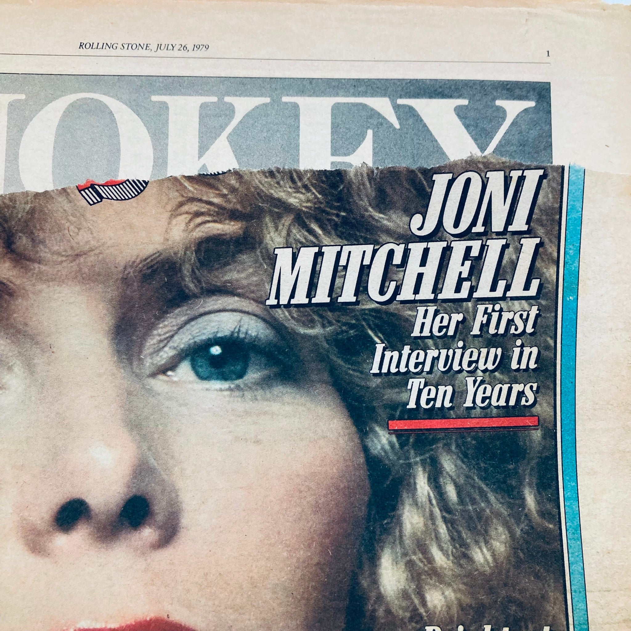 Close-up of the Rolling Stone Magazine July 26 1979 cover, highlighting Joni Mitchell and the announcement of her exclusive interview, emphasizing the cultural significance of the issue.