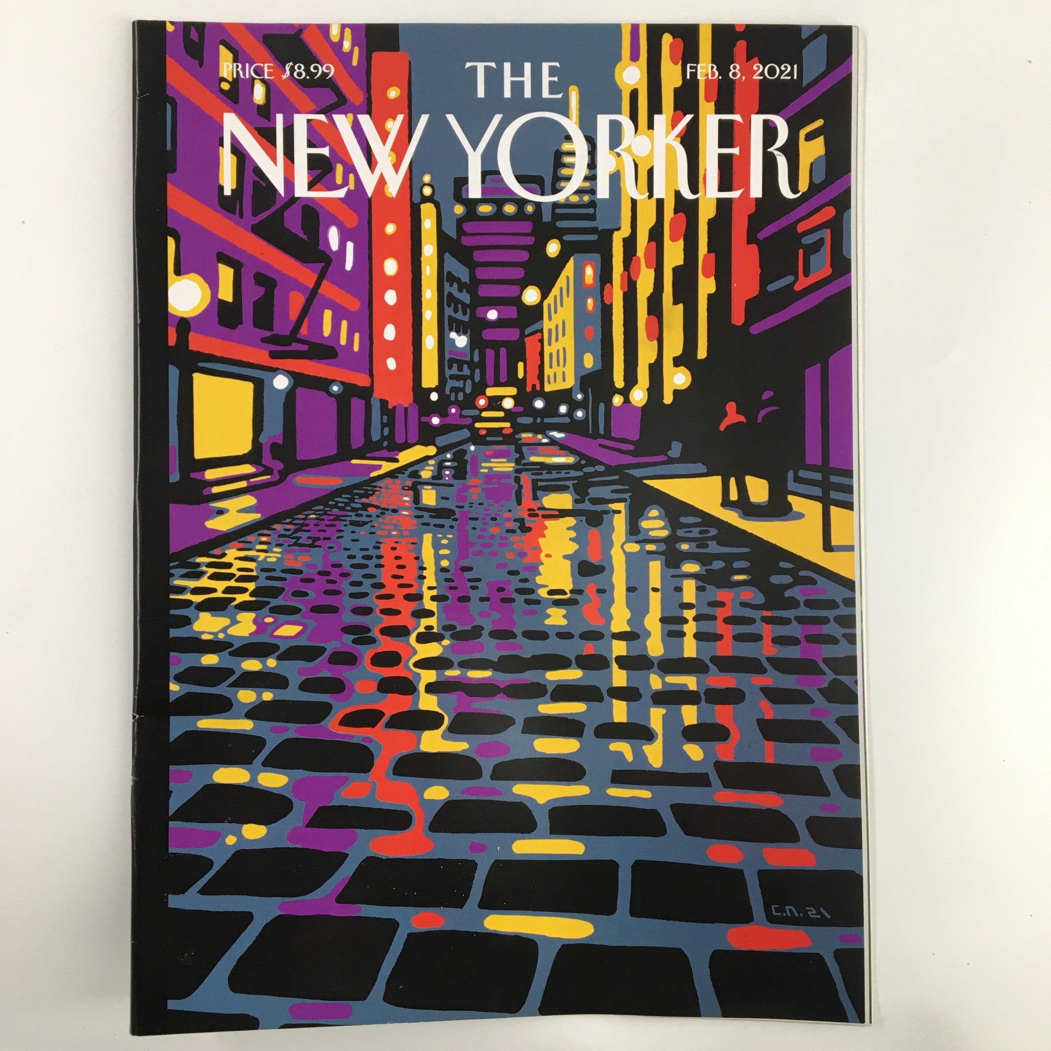 Cover of The New Yorker magazine, February 8, 2021, featuring vibrant street scene illustration 'Wooster Street' by Christoph Niemann, showcasing colorful reflections on wet pavement.