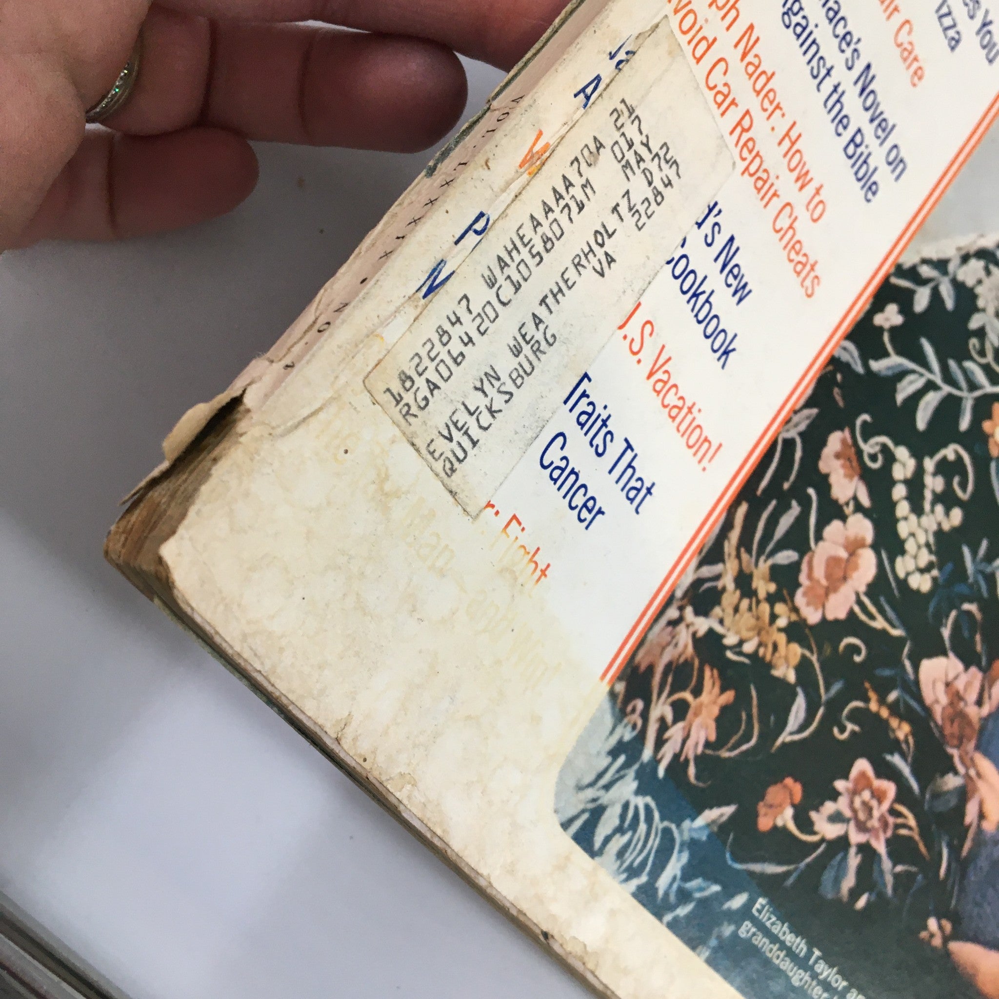 Close-up view of the spine of the Ladies' Home Journal Magazine April 1972, showing address label and vintage design elements.