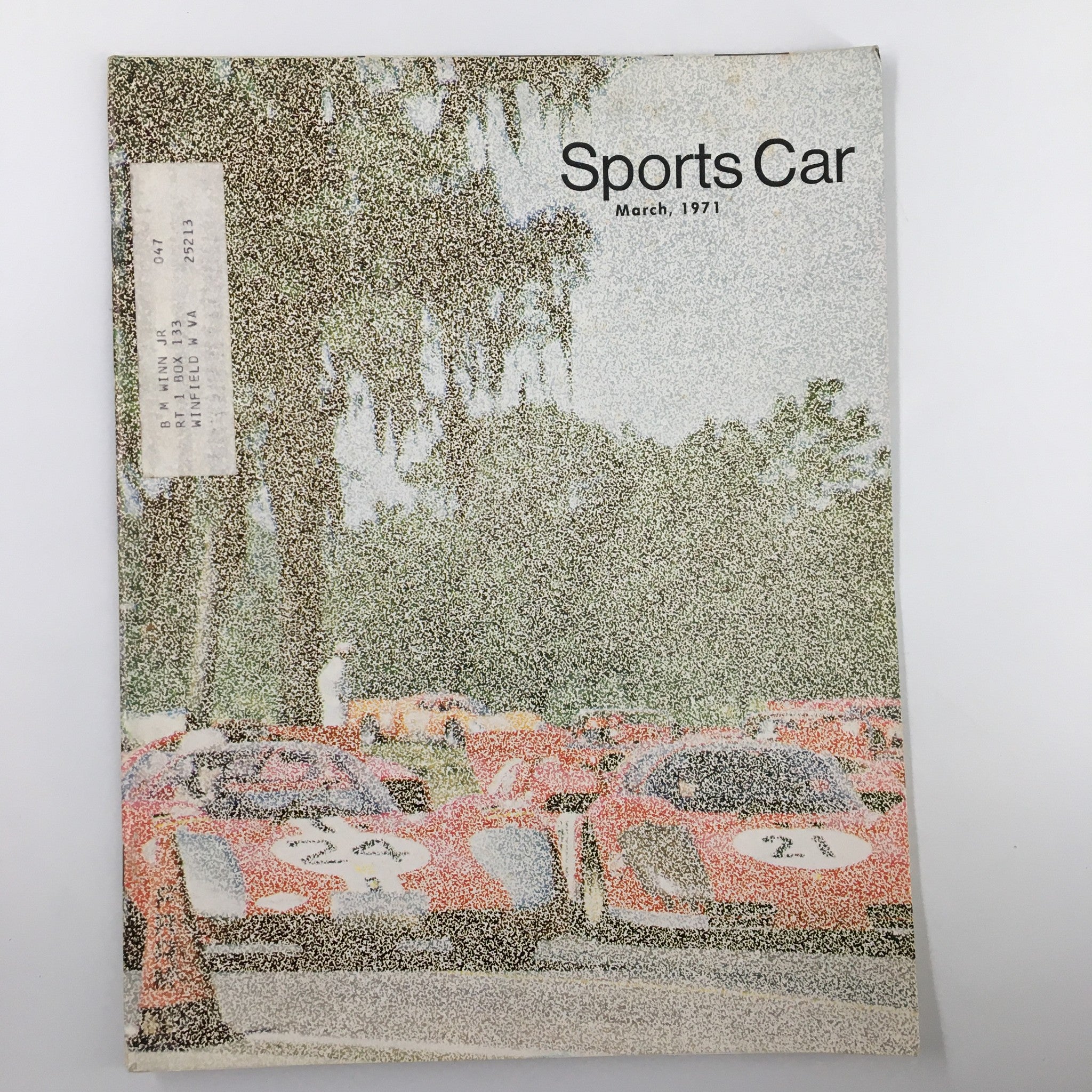 Cover of VTG Sports Car Magazine March 1971 featuring Oscar Koveleski of the Polish Racing Association, showcasing vintage racing cars in a scenic location.