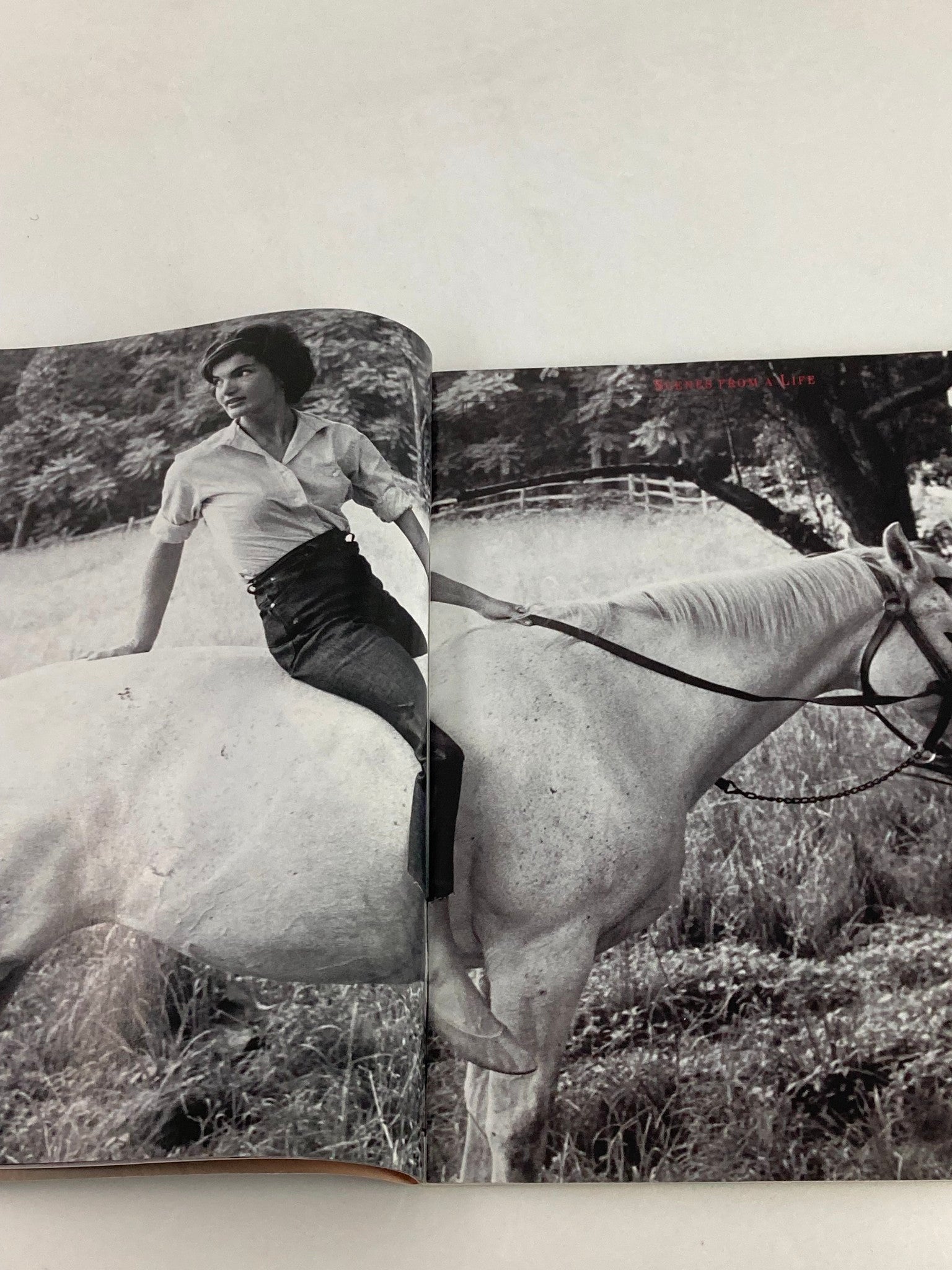 A stunning black and white photograph of Jacqueline Kennedy Onassis riding a horse, featured in People Weekly Tribute Magazine Summer 1994.