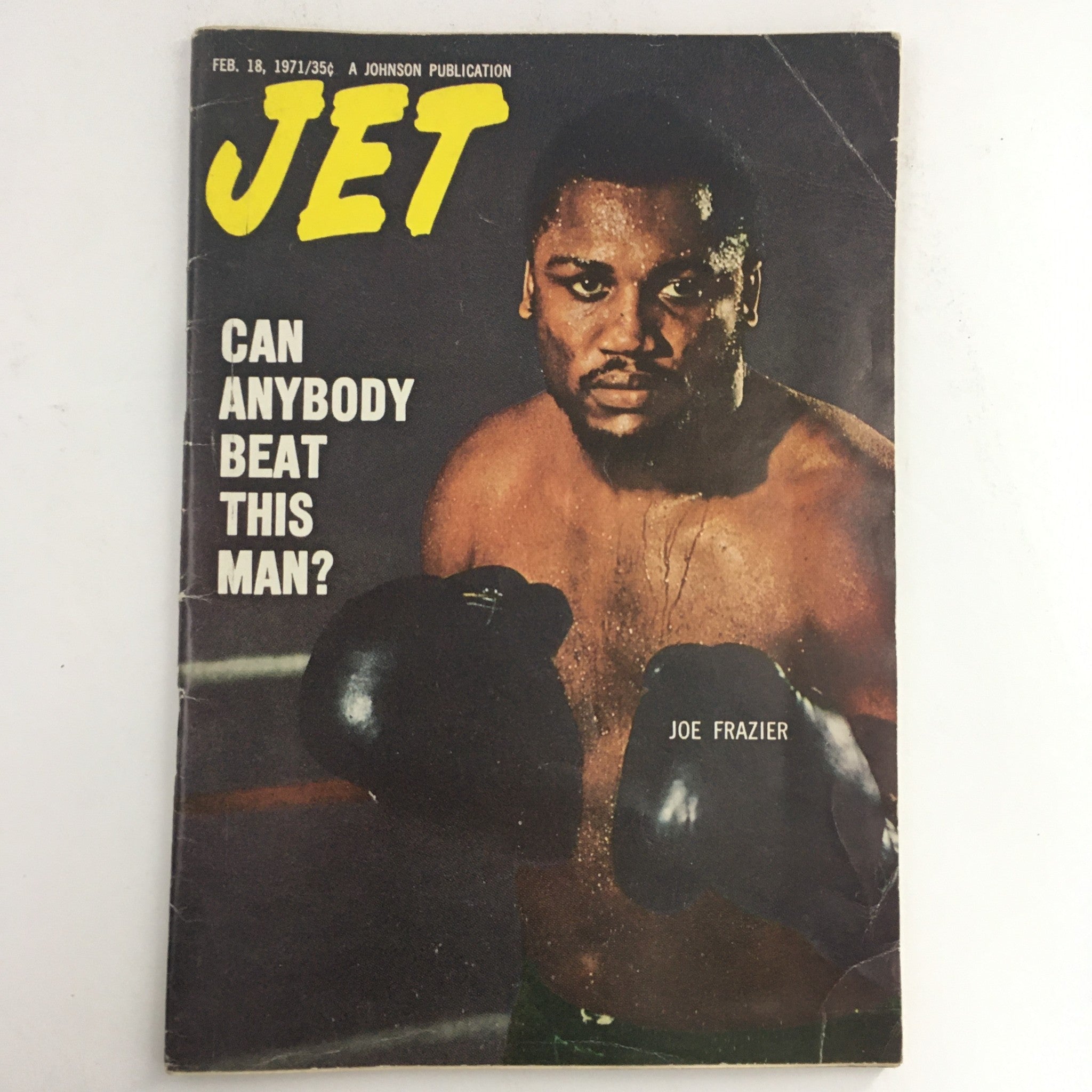 Cover of Jet Magazine from February 18, 1971 featuring Joe Frazier with the headline 'Can Anybody Beat This Man?' showcasing a striking image of the boxing champion in action.
