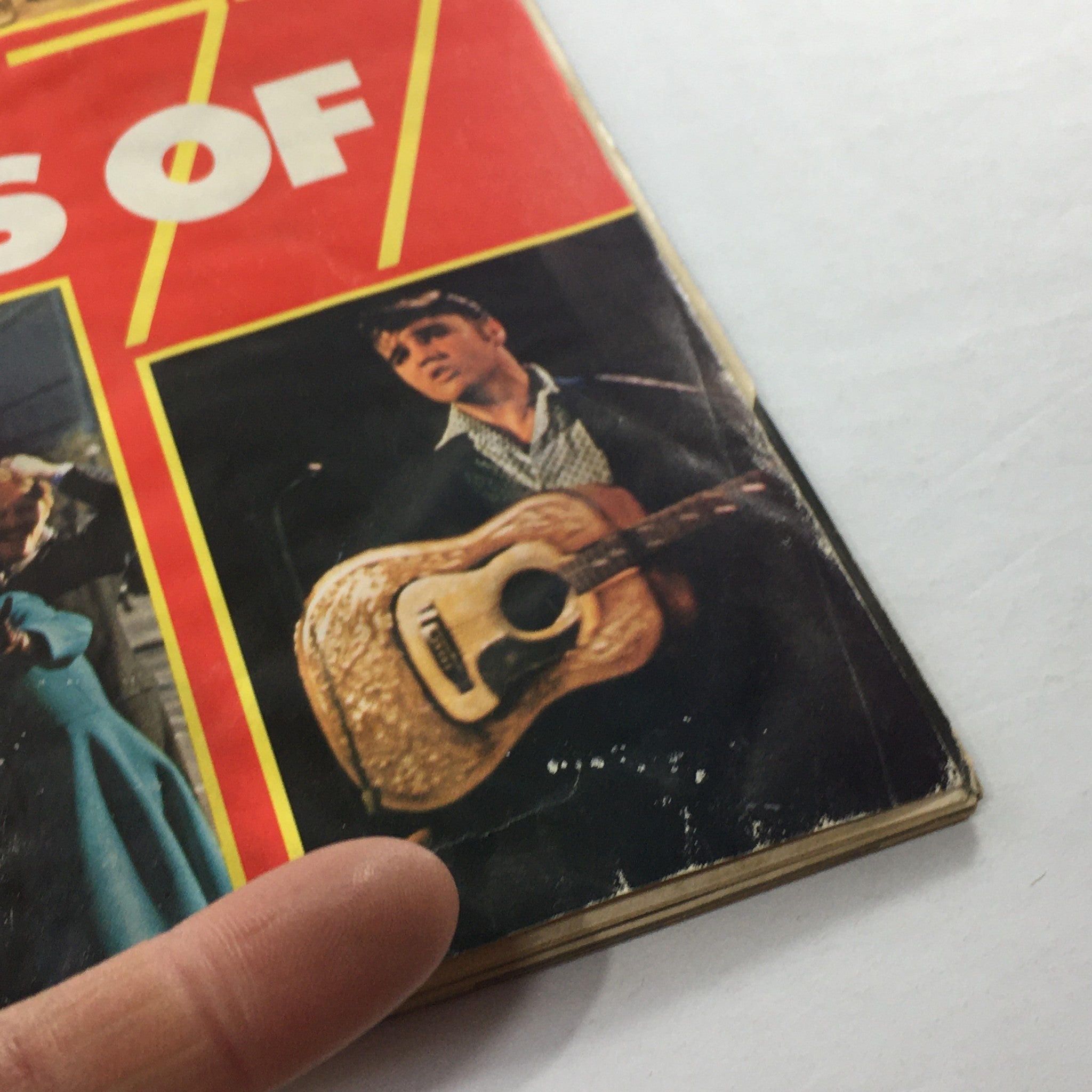 Detailed view of the Newsweek Magazine cover from December 26, 1977, showcasing the title 'Pictures of 77' and featuring a musician holding a guitar.