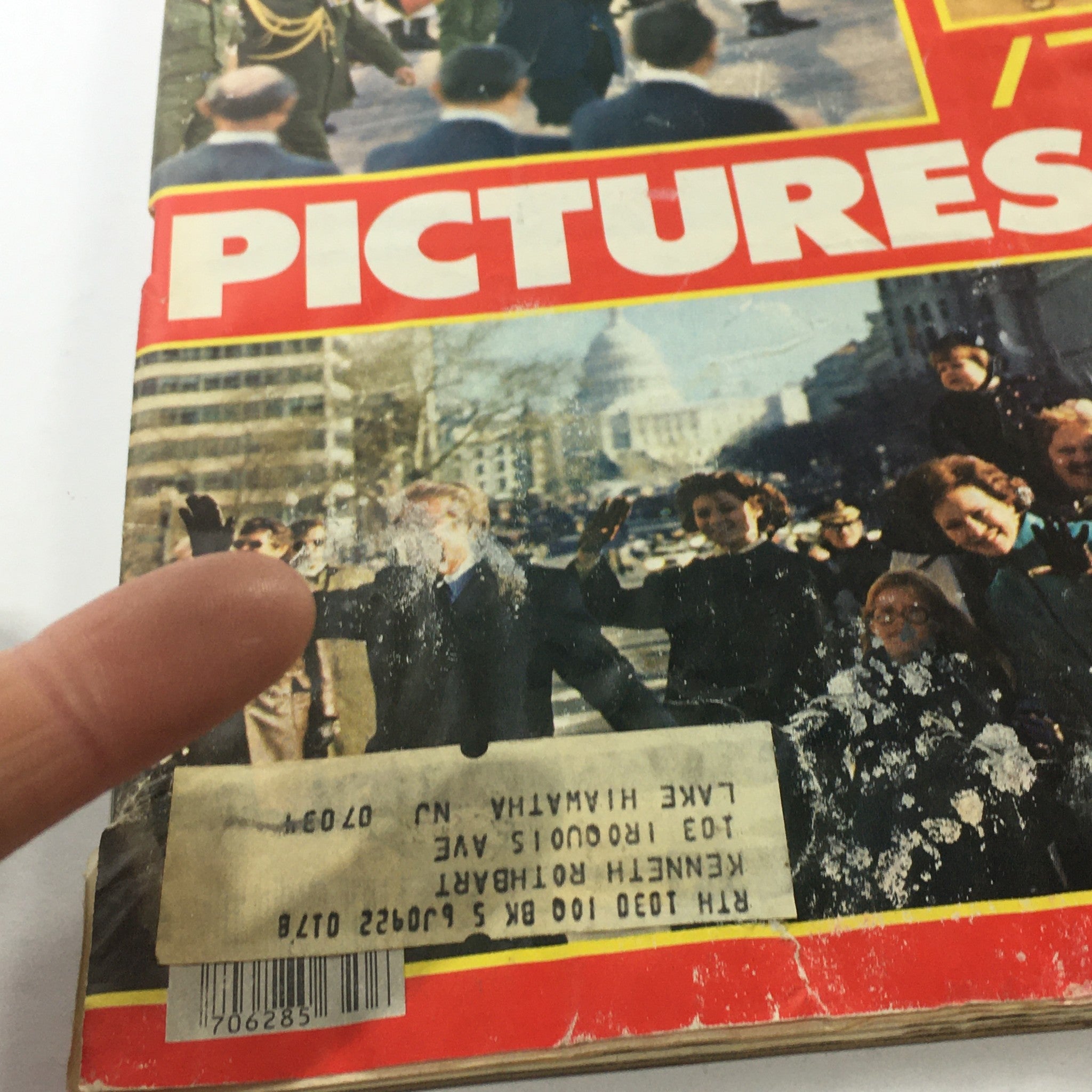 Side view of the Newsweek Magazine cover dated December 26, 1977, displaying the title 'Pictures of 77' with a finger pointing at a historical event captured on the cover.