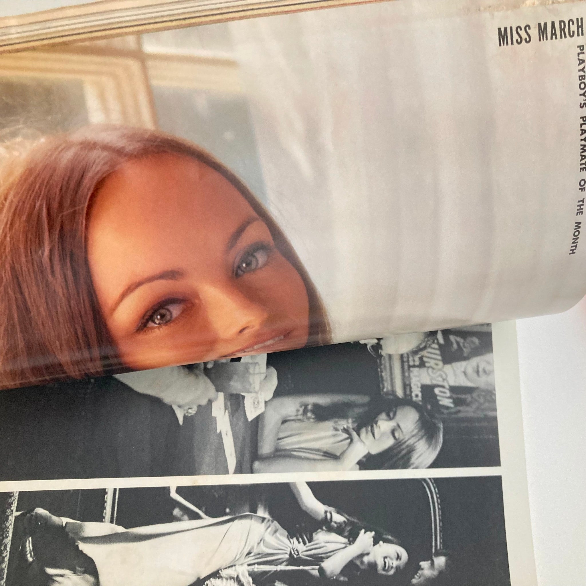 Interior page of the VTG Playboy Magazine March 1973, showcasing the centerfold of Bonnie Large along with additional black and white photographs, emphasizing vintage style.