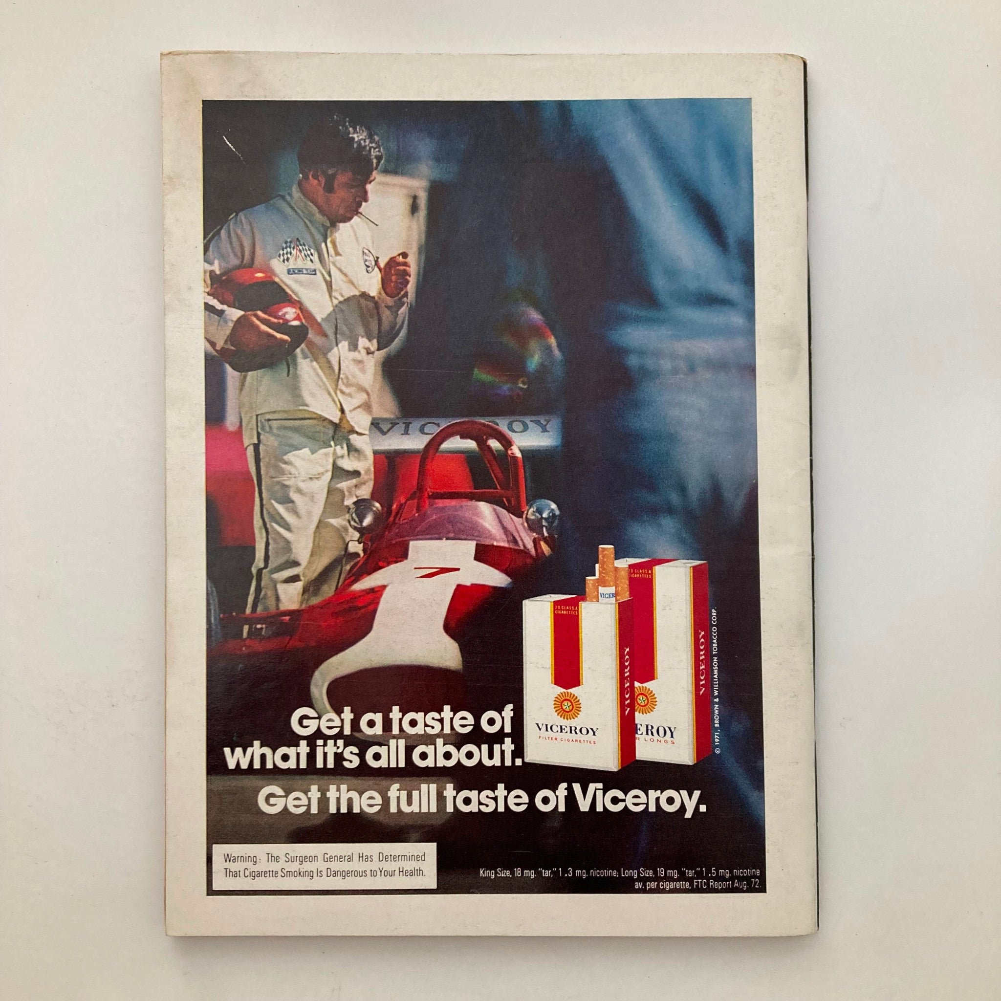Vintage Playboy Magazine March 1973 featuring Bonnie Large with Centerfold, showcasing an advertisement for Viceroy cigarettes on the back cover, depicting a race car driver with a cigarette.