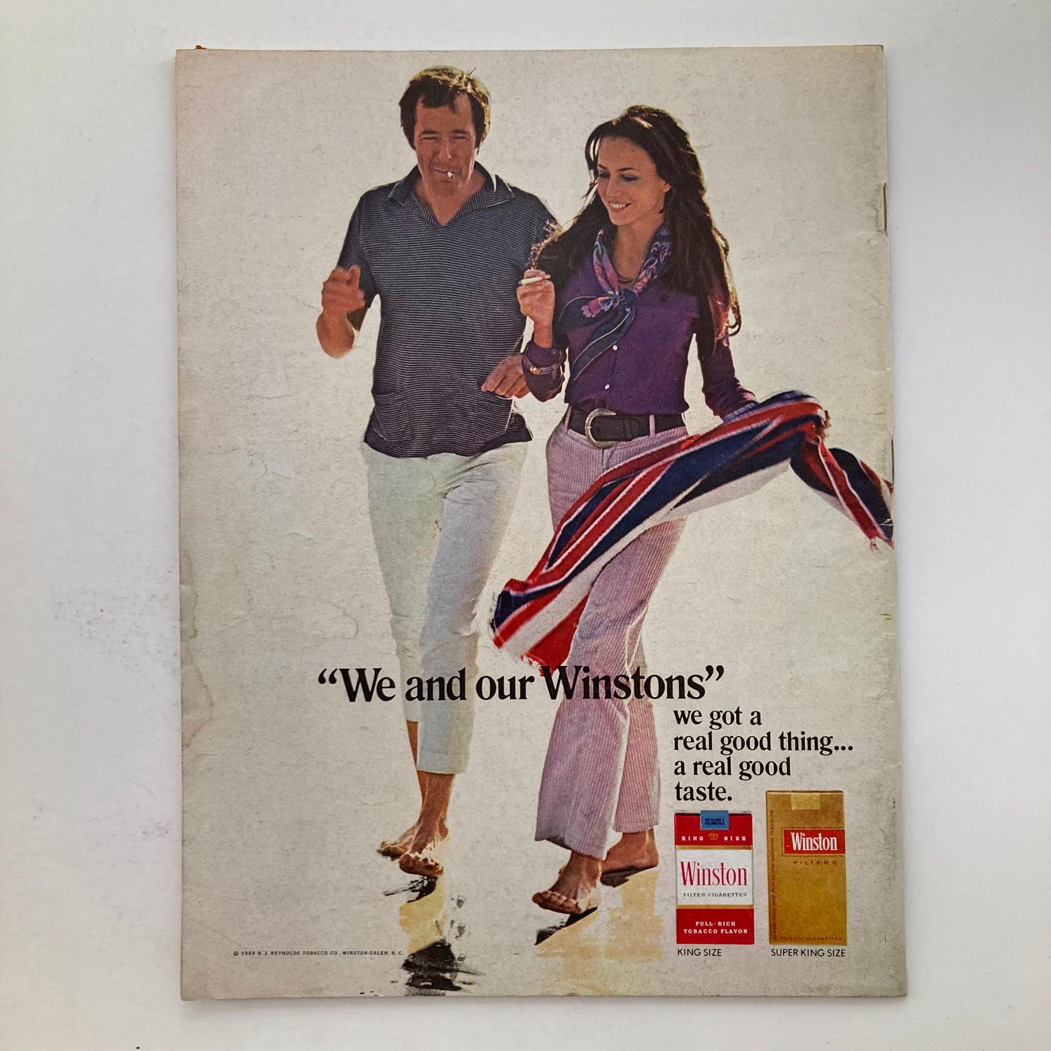 Back cover of VTG Newsweek Magazine January 12 1970 featuring an advertisement for Winston cigarettes with a couple walking on the beach, reinforcing the vintage aesthetic of the magazine.