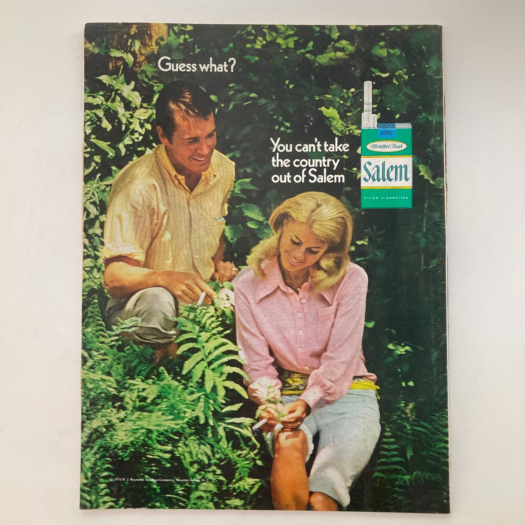 Cover of VTG Newsweek Magazine from May 4, 1970 titled 'Now It's The Indochina War Cambodian Troops', featuring two individuals in a lush green setting, illustrating the connection to nature and a vintage advertisement.