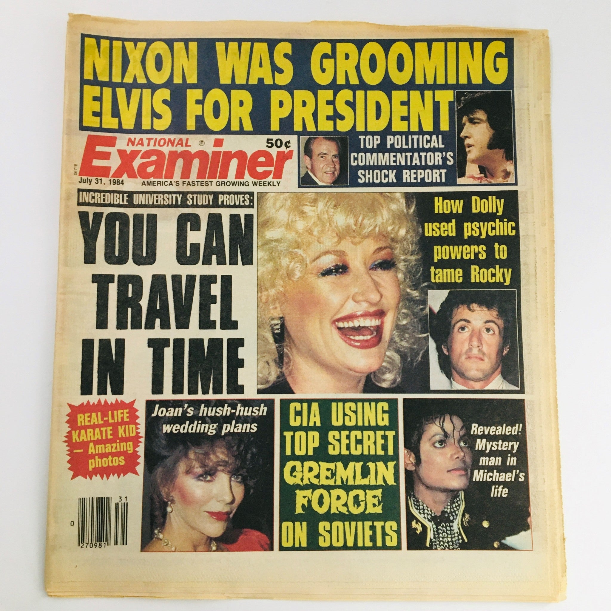 Cover of National Examiner Magazine July 31 1984 featuring stories about Michael Jackson, Dolly Parton, and Elvis Presley. The cover highlights intriguing topics such as 'Nixon was grooming Elvis for President' and 'How Dolly used psychic powers to tame Rocky'. This vintage magazine is a collectible item for fans of 1980s pop culture.