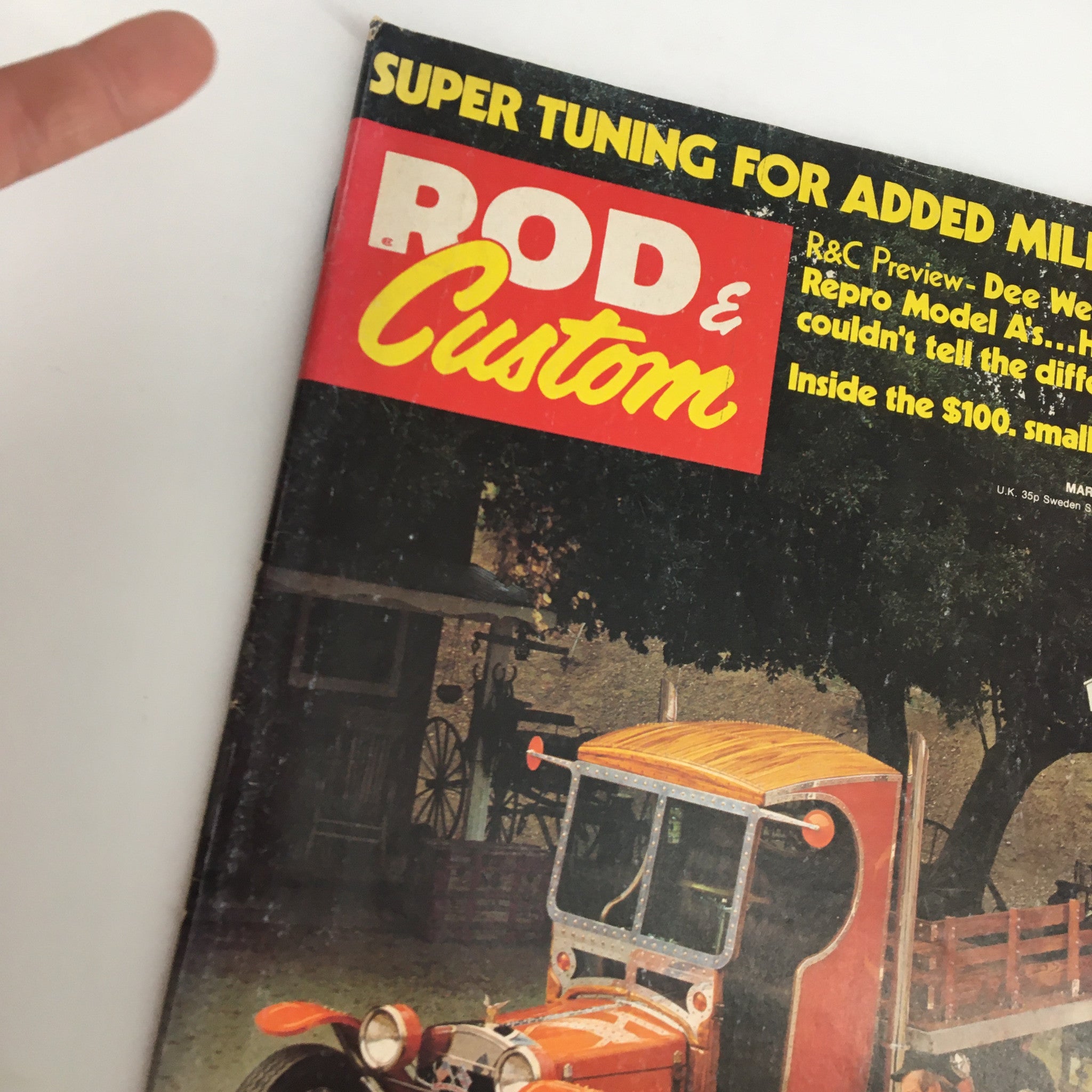 Close-up of the top section of the VTG Rod & Custom Magazine March 1974 titled 'The Pruf' is in his Project showing part of the vintage truck and magazine title.