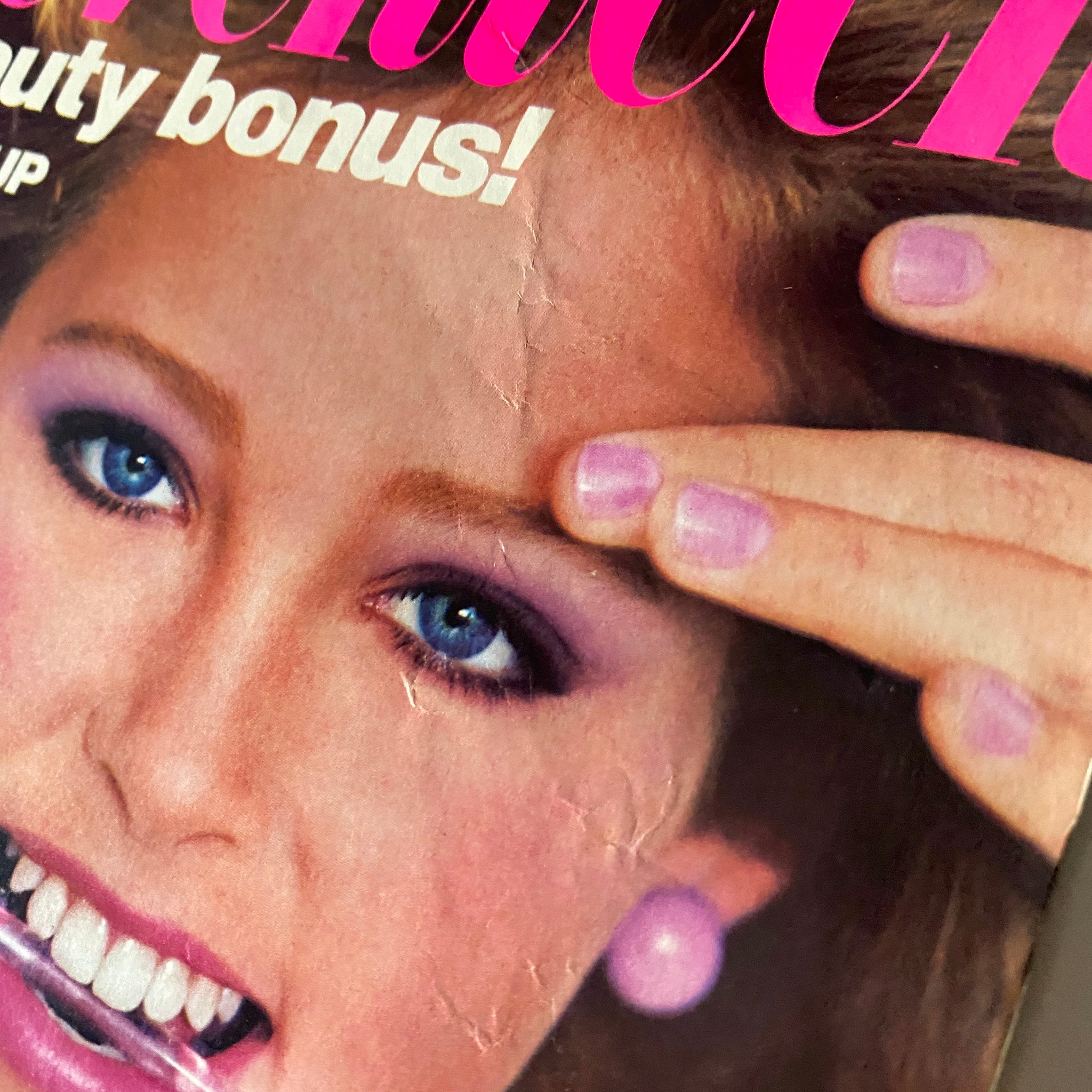 Seventeen Magazine June 1983 cover featuring a model with blue eyes and purple makeup, promoting summer beauty tips.
