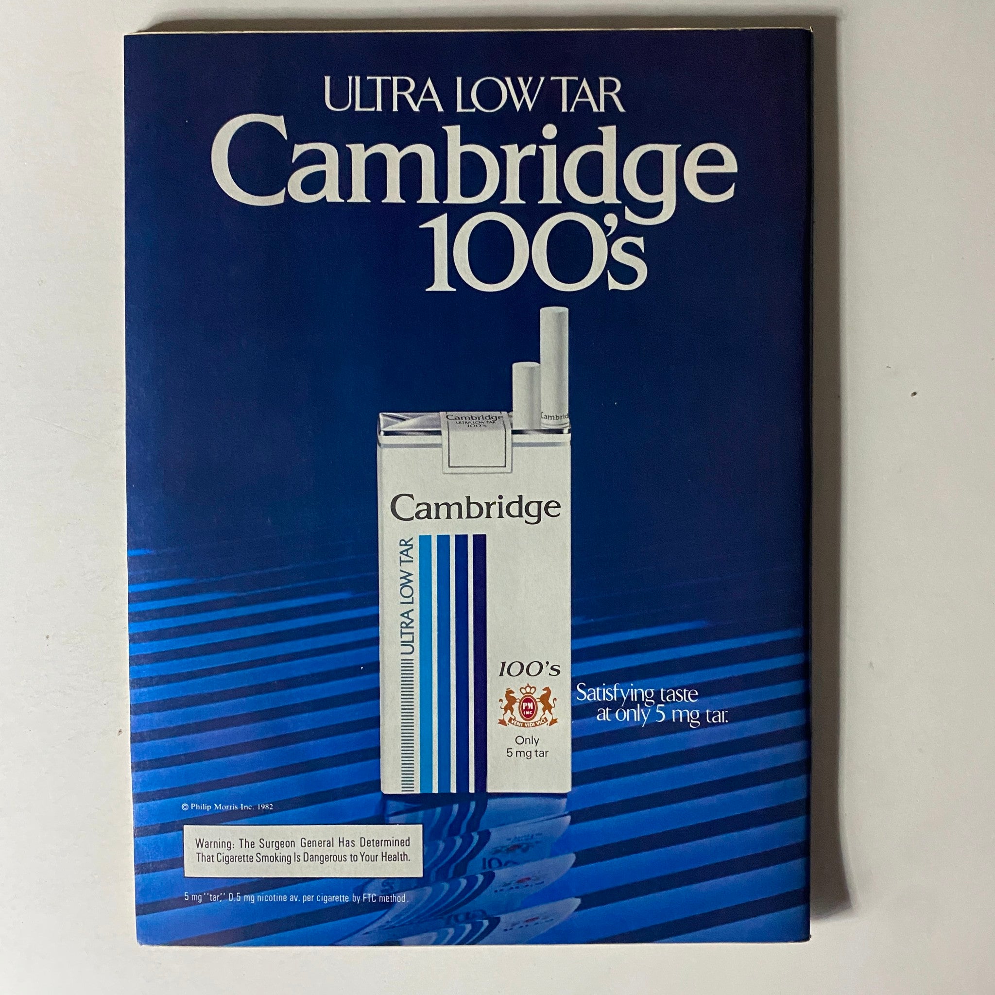 Advertisement for Cambridge 100's cigarettes included in the People Weekly Magazine October 11, 1982 issue.