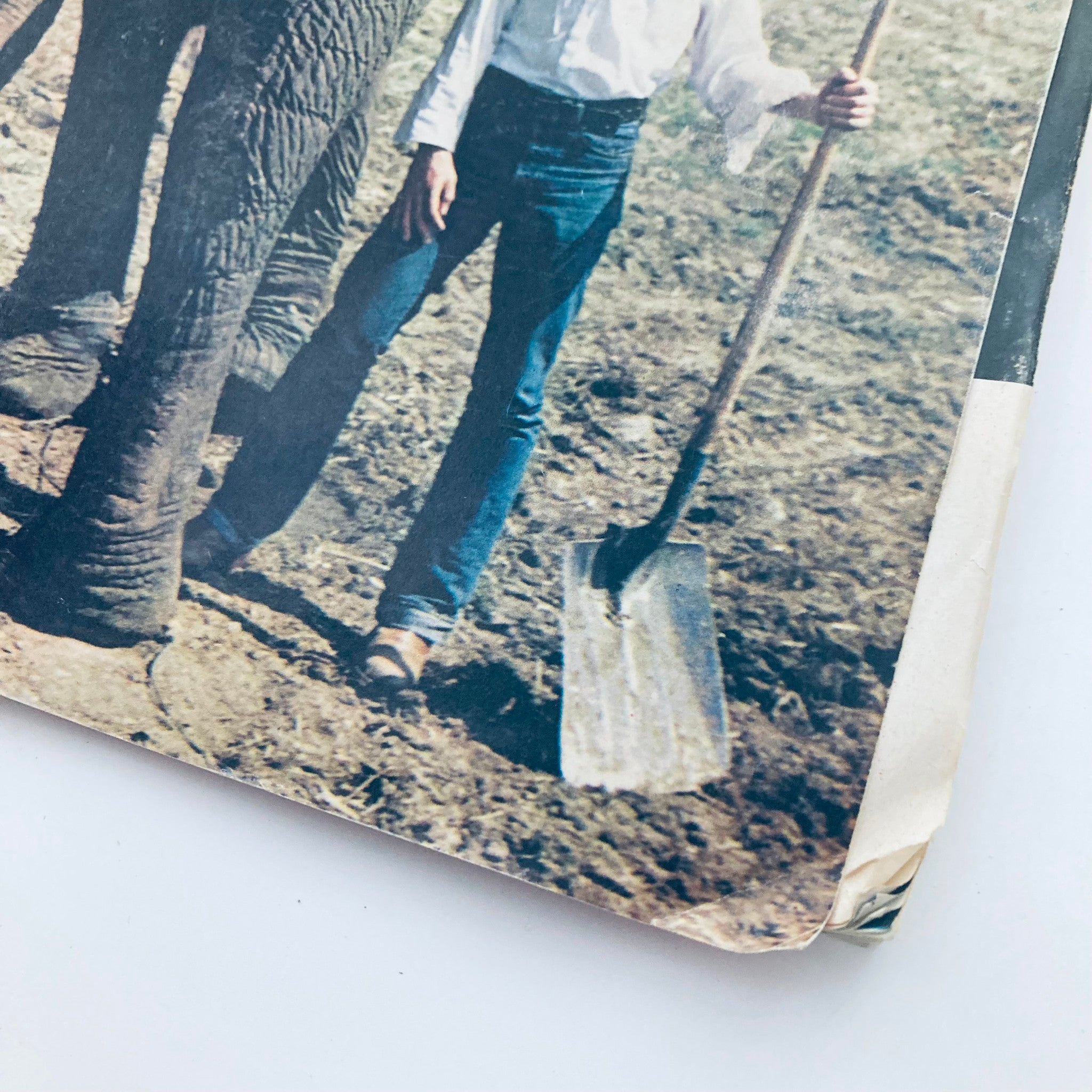 Cover of Vtg National Lampoon Magazine June 1977 featuring 'Operation Turn Rubber', showcasing a unique vintage style with an elephant and a shovel.