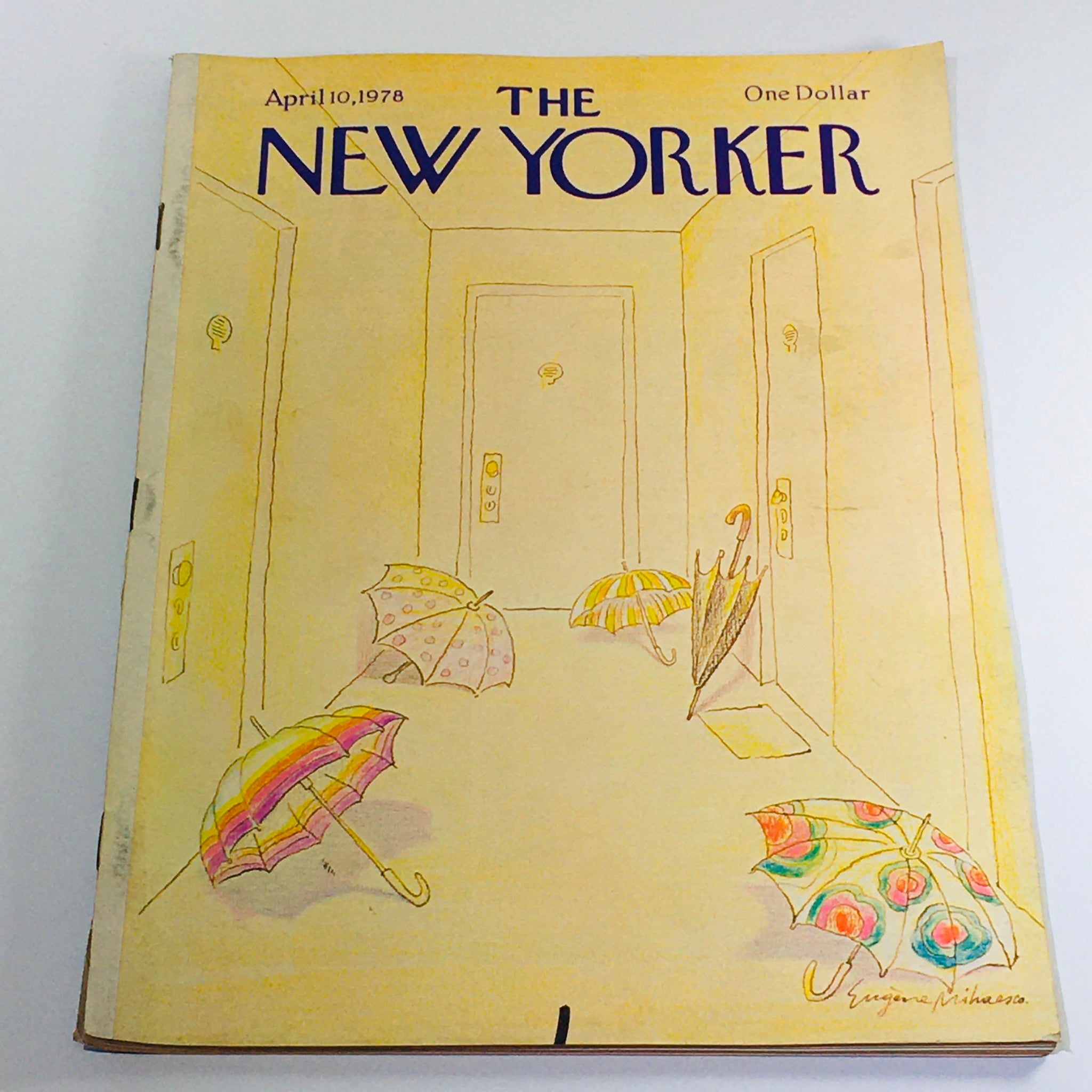 The New Yorker: April 10 1978 full magazine cover featuring a pastel illustration of umbrellas in a hallway by Eugene Mihaesco.