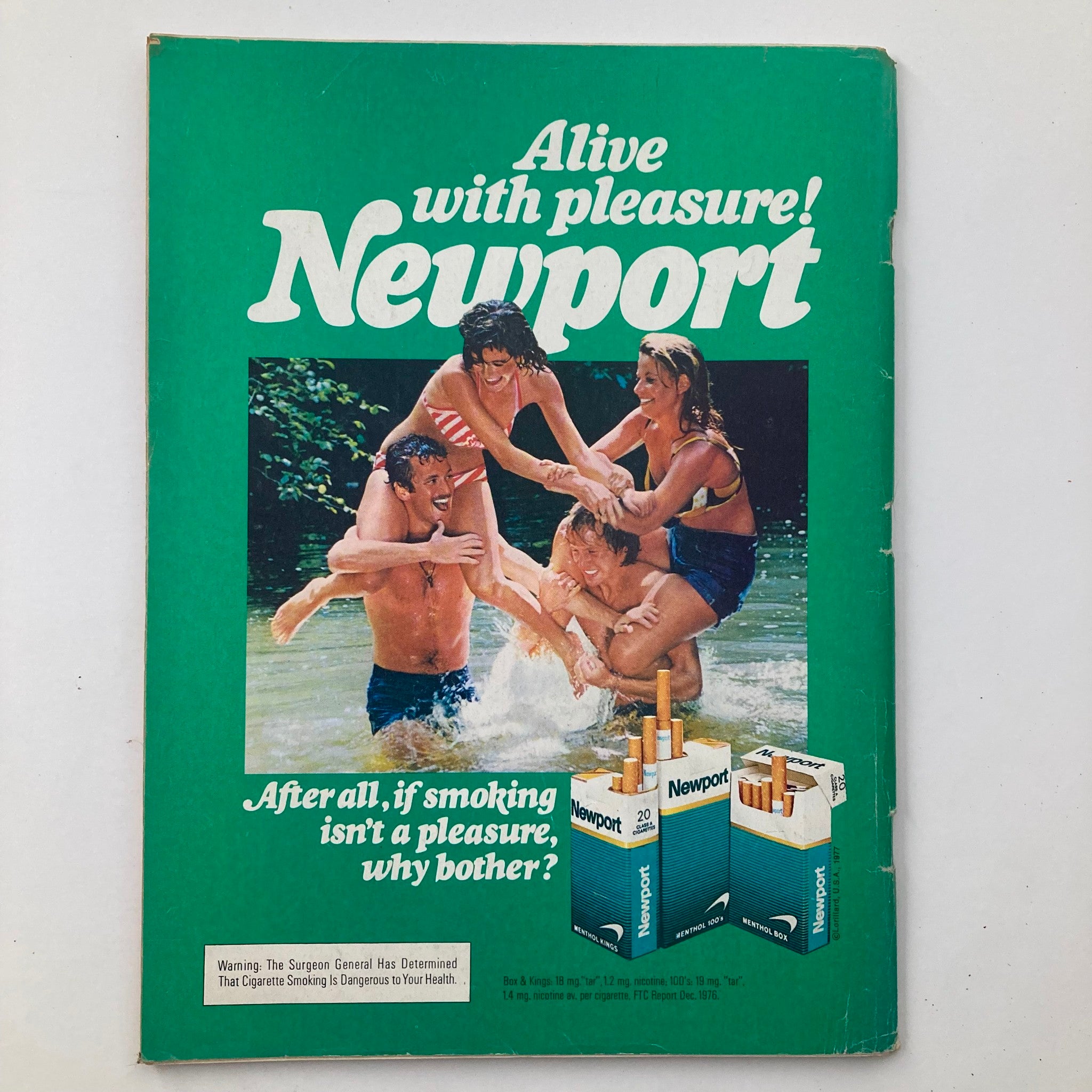 Back cover of Vintage National Lampoon Magazine June 1977 Vol 1 #87 displaying an advertisement for Newport cigarettes with images of people enjoying summer fun.