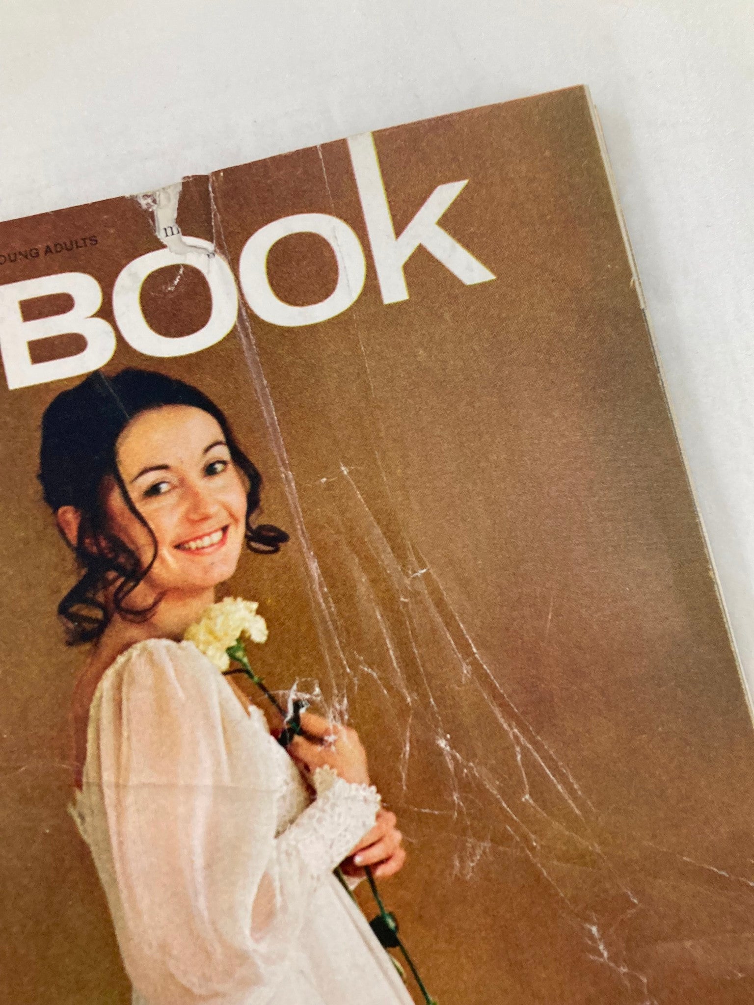 Close-up view of the cover of VTG Redbook Magazine September 1970, highlighting Mary Hayden smiling in a white dress, with details of magazine wear and tear.