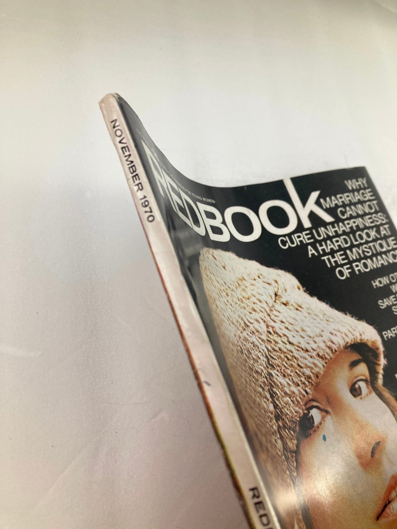 Side view of VTG Redbook Magazine November 1970, highlighting the publication date and the cover photograph of Alva Hellstrom.